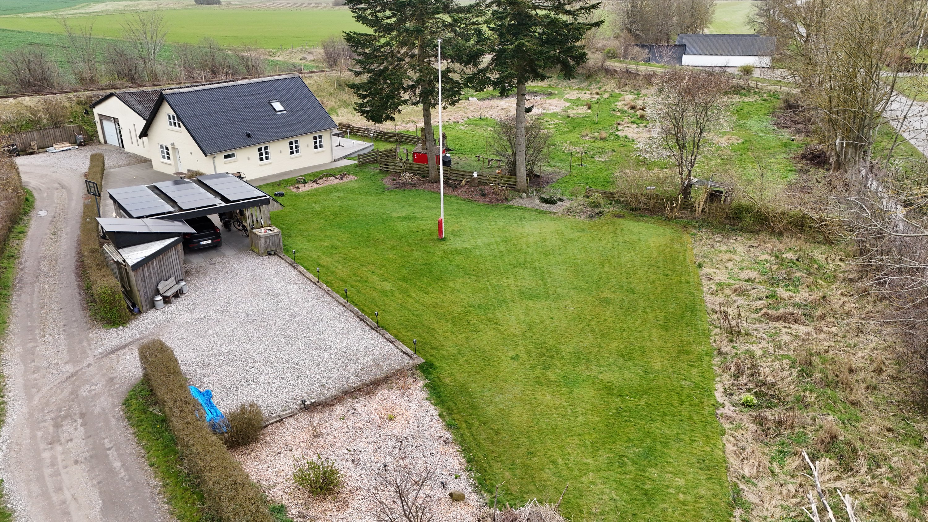 Fremhævet drone billede i fuldskærmstilstand. Billede af Banevolden 1, Handest, 8990 Fårup