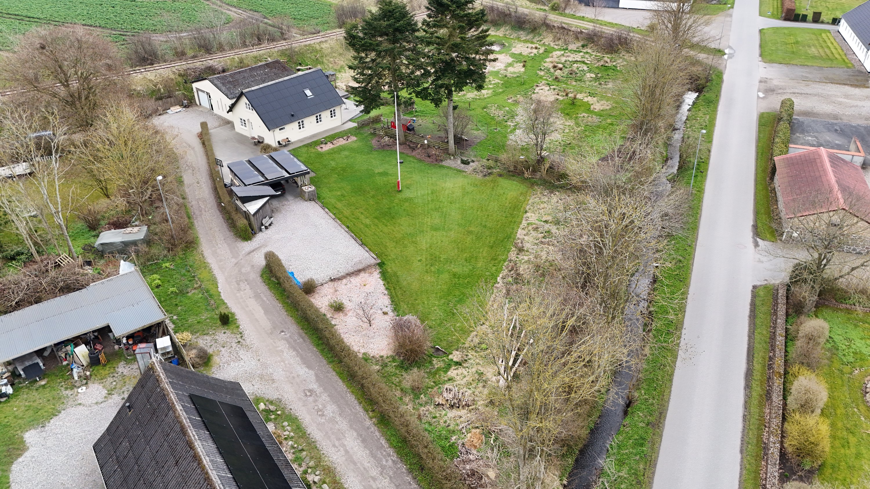 Fremhævet drone billede i fuldskærmstilstand. Billede af Banevolden 1, Handest, 8990 Fårup