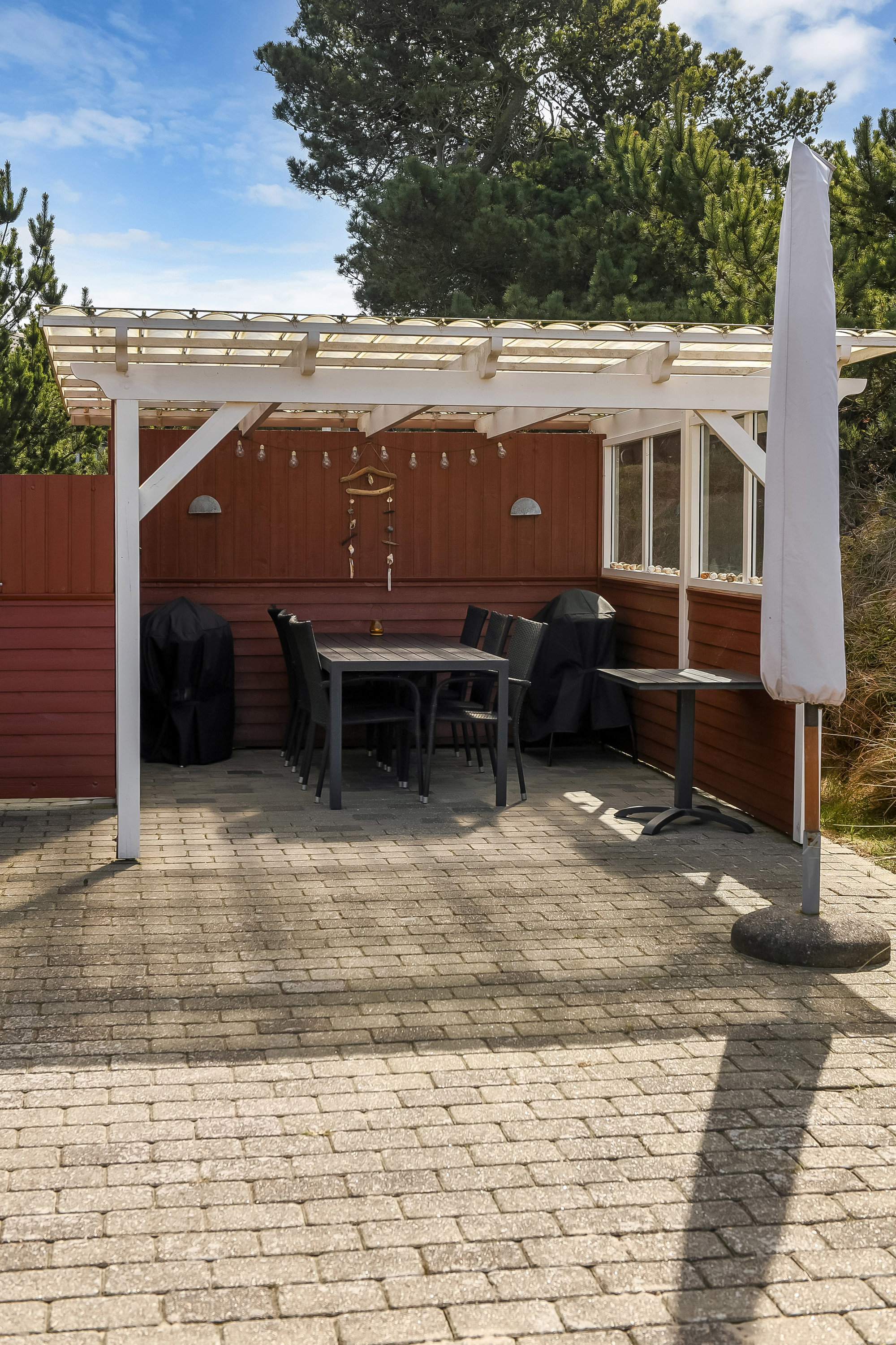 Fremhævet terrasse billede i fuldskærmstilstand. Billede af Strandgårdsvej 11, Rindby Strand, 6720 Fanø