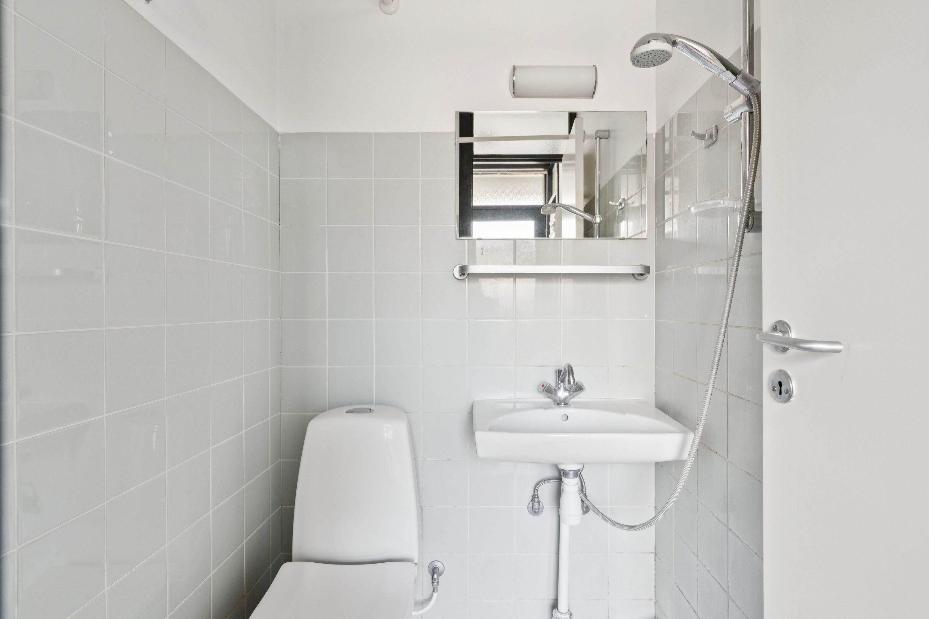 Fremhævet badeværelse billede i fuldskærmstilstand. Billede af Vestervang 10, 1. 1011., 8000 Aarhus C