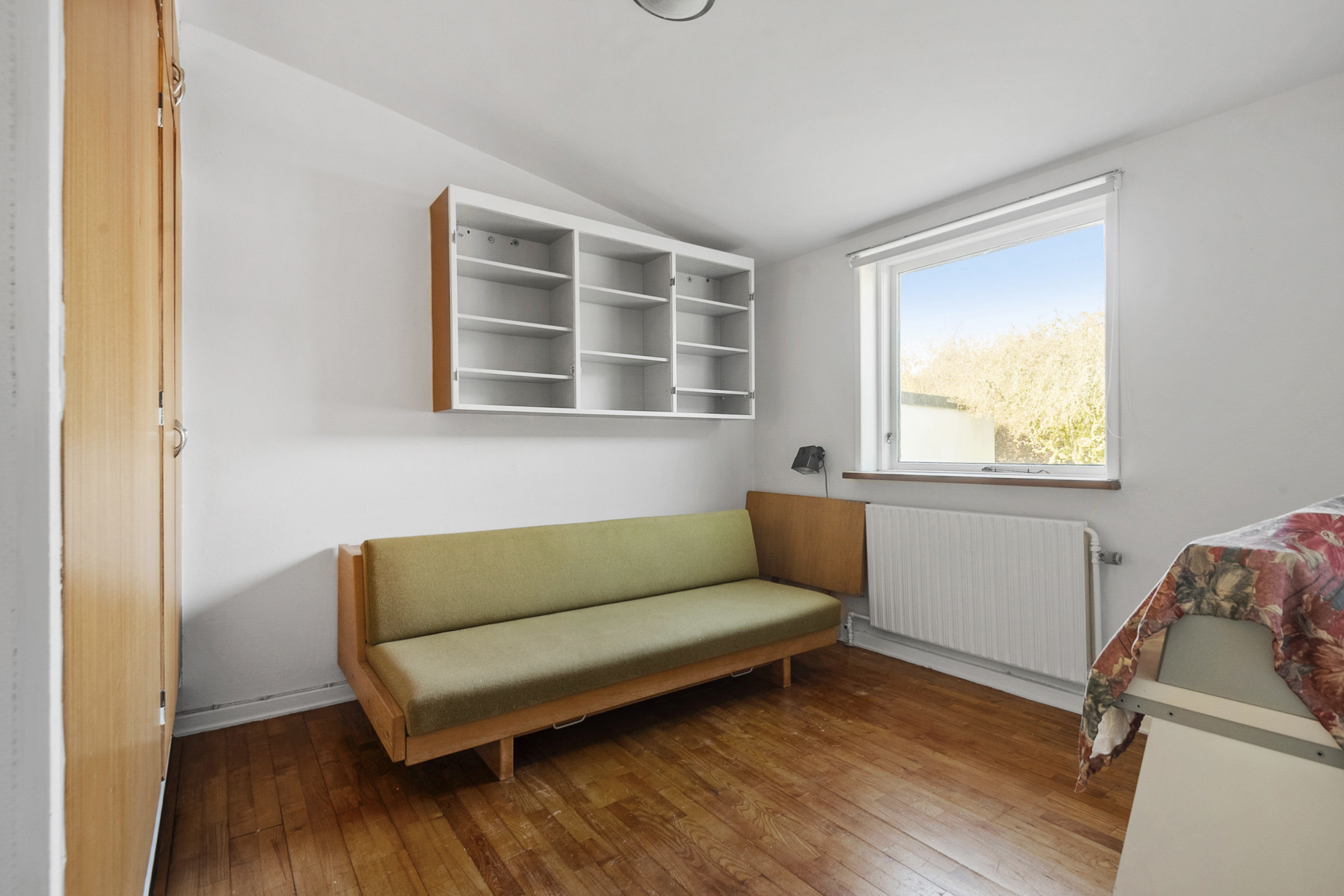 Fremhævet stue billede i fuldskærmstilstand. Billede af Vølundsvej 10, 6705 Esbjerg Ø