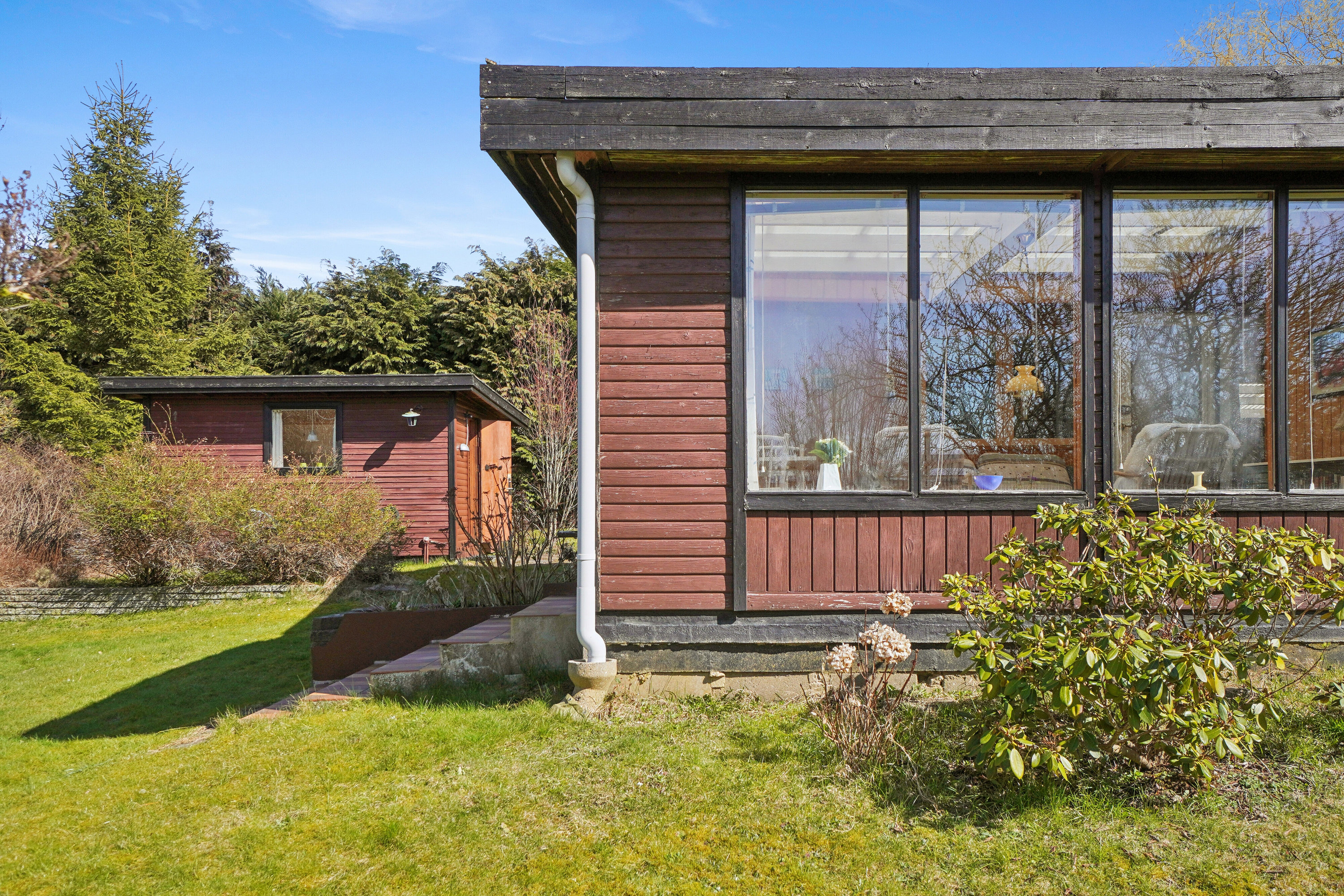 Fremhævet set fra haven billede i fuldskærmstilstand. Billede af Dalsvinget 15, Store Havelse Strand, 3310 Ølsted