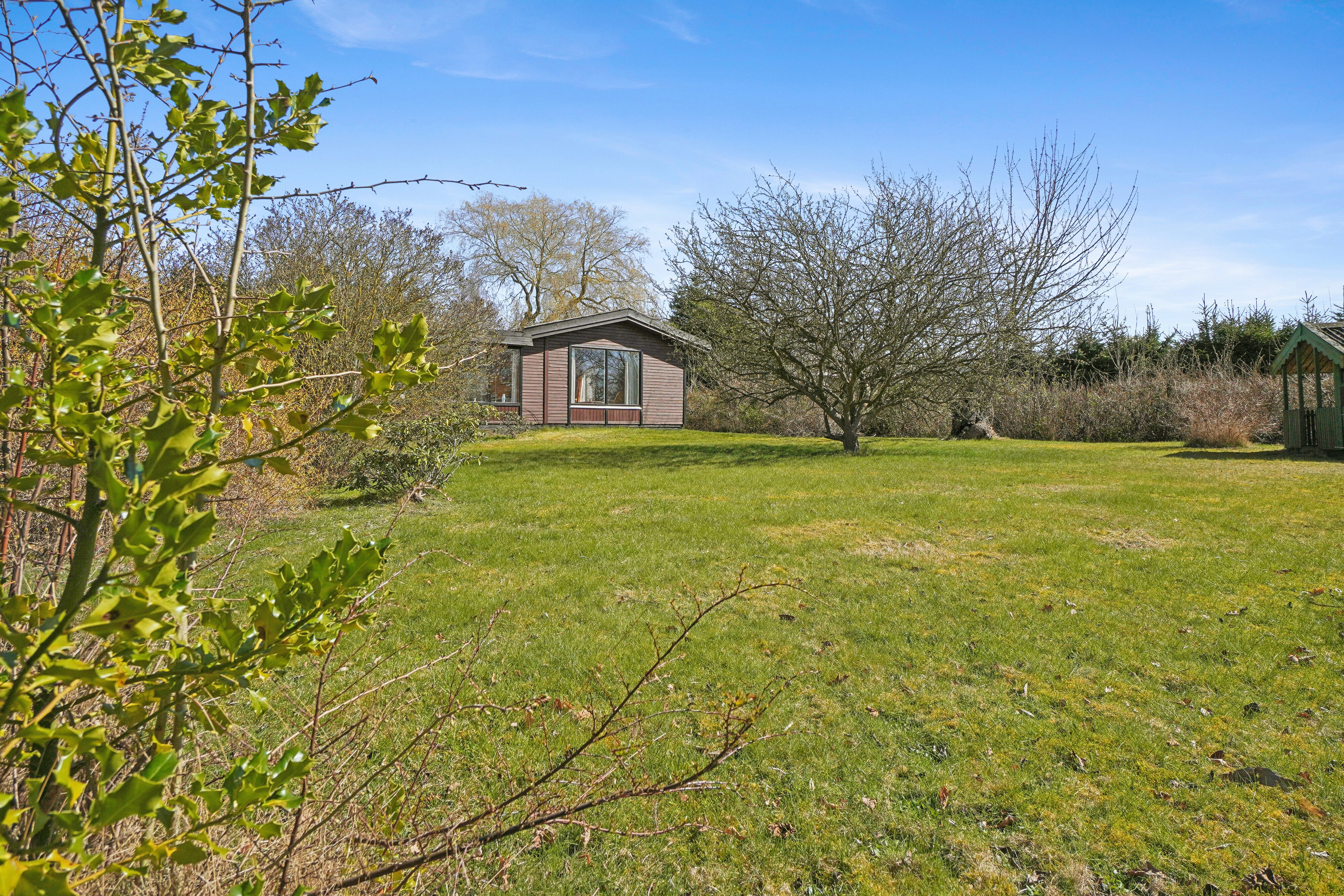 Fremhævet set fra haven billede i fuldskærmstilstand. Billede af Dalsvinget 15, Store Havelse Strand, 3310 Ølsted