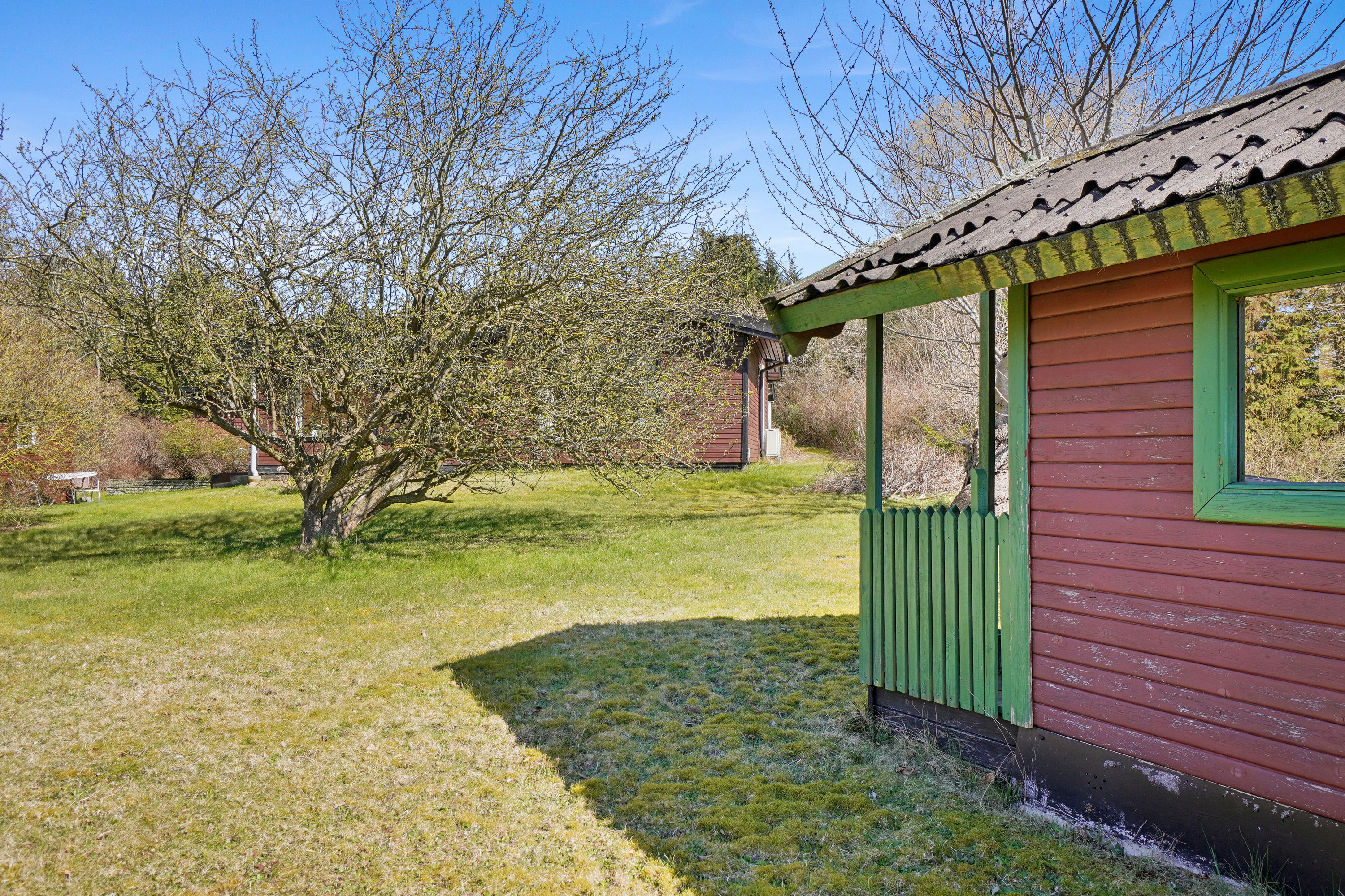 Fremhævet set fra haven billede i fuldskærmstilstand. Billede af Dalsvinget 15, Store Havelse Strand, 3310 Ølsted