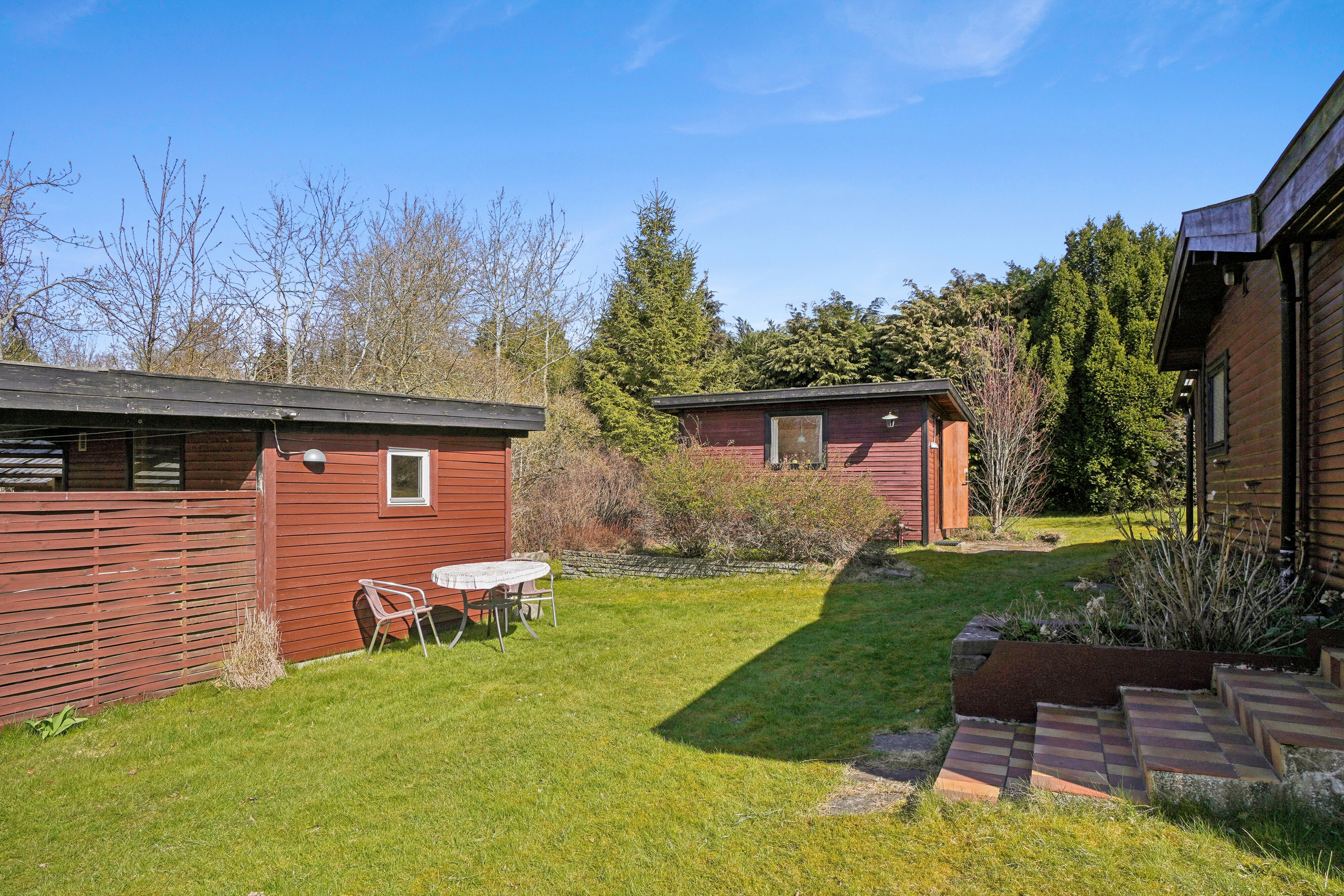 Fremhævet set fra haven billede i fuldskærmstilstand. Billede af Dalsvinget 15, Store Havelse Strand, 3310 Ølsted