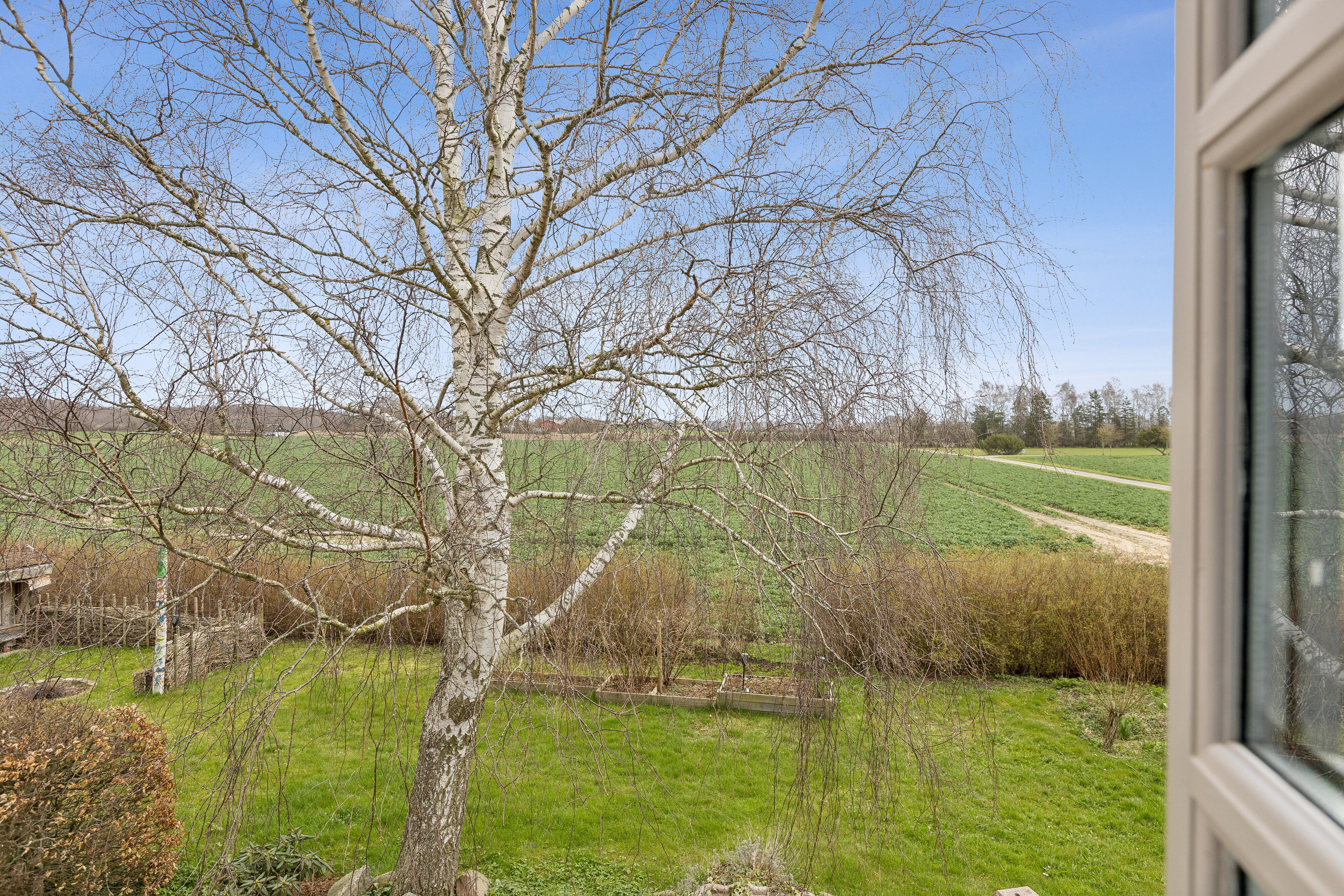 Fremhævet set fra haven billede i fuldskærmstilstand. Billede af Nordhøjvej 48, Smerup, 4653 Karise