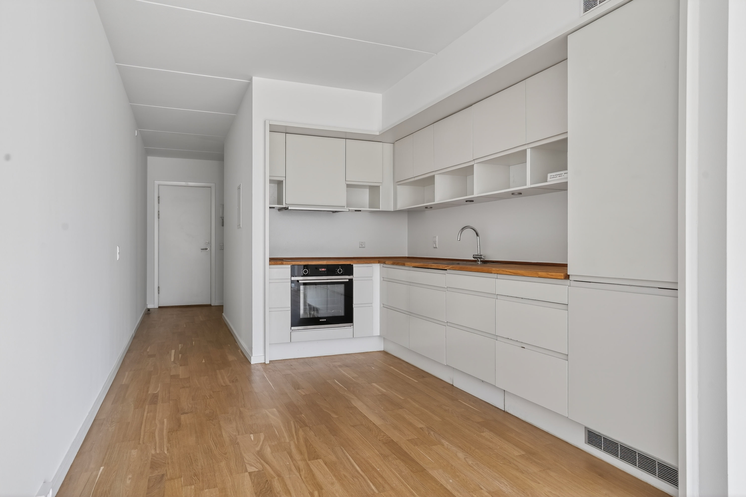 Fremhævet køkken billede i fuldskærmstilstand. Billede af Gyngemose Parkvej 16, st.. mf., 2860 Søborg