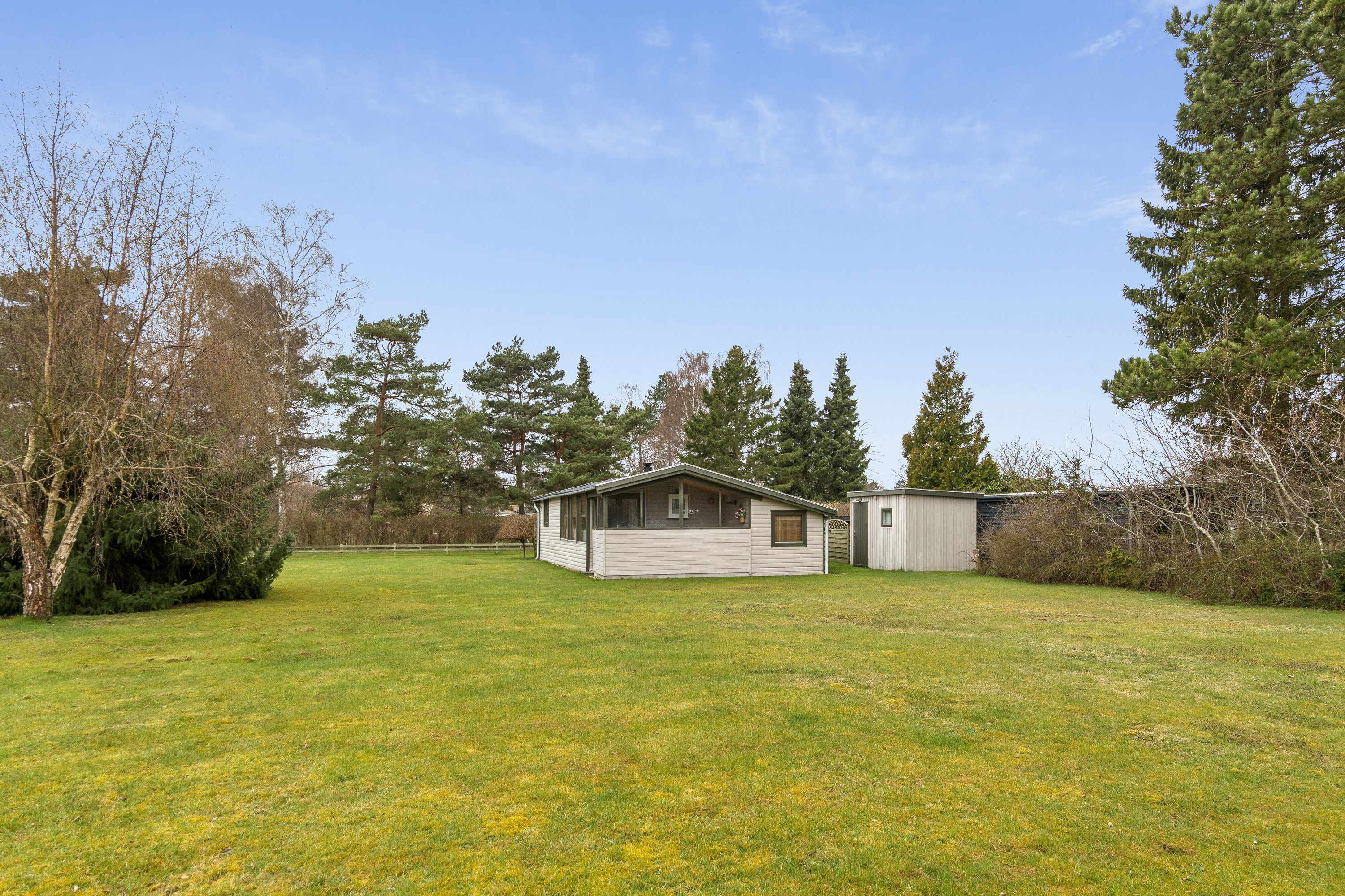 Fremhævet set fra haven billede i fuldskærmstilstand. Billede af Hvidtjørnevej 13, Kaldred, 4593 Eskebjerg