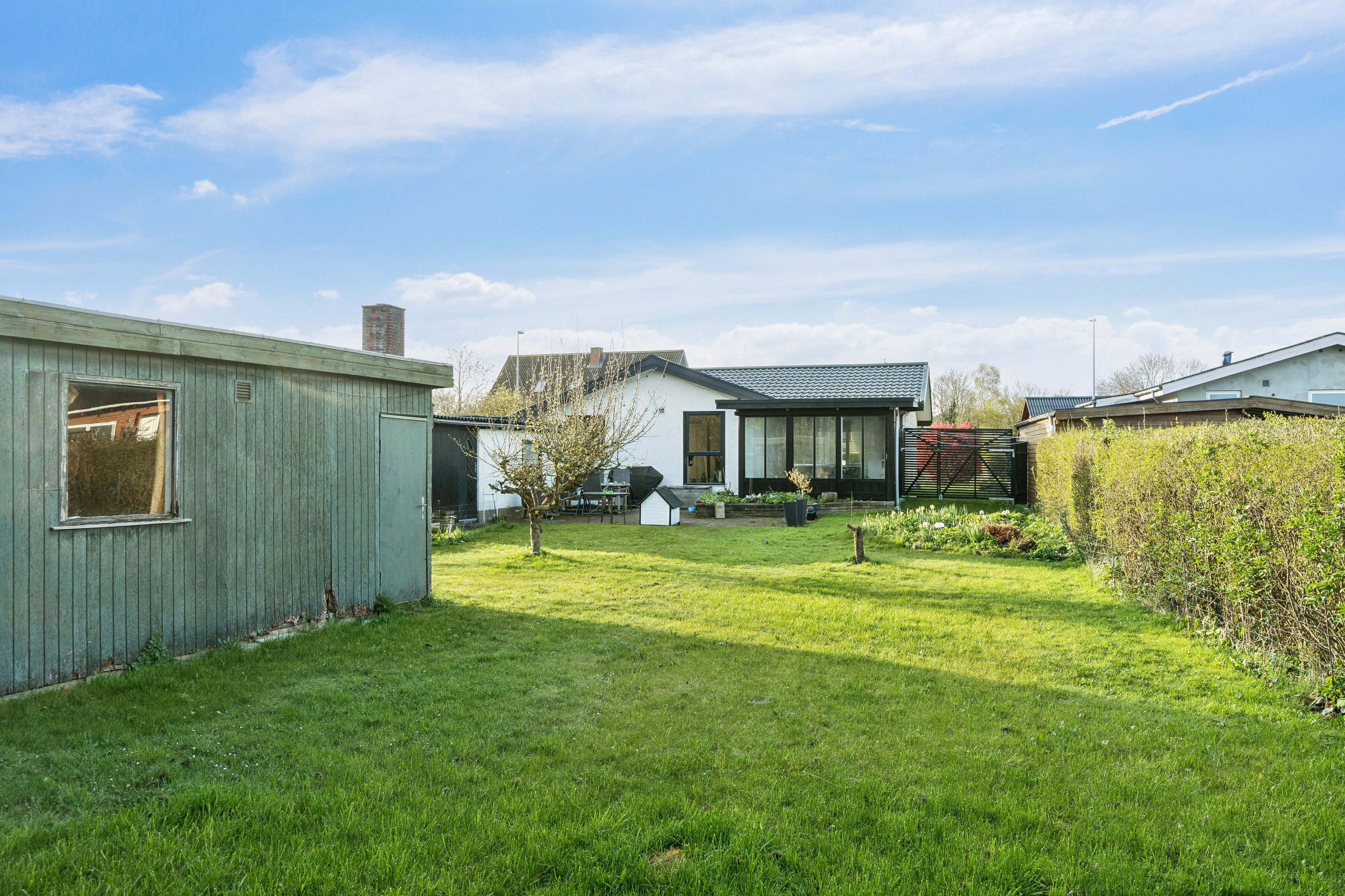 Fremhævet set fra haven billede i fuldskærmstilstand. Billede af Jasminvej 31, 4200 Slagelse