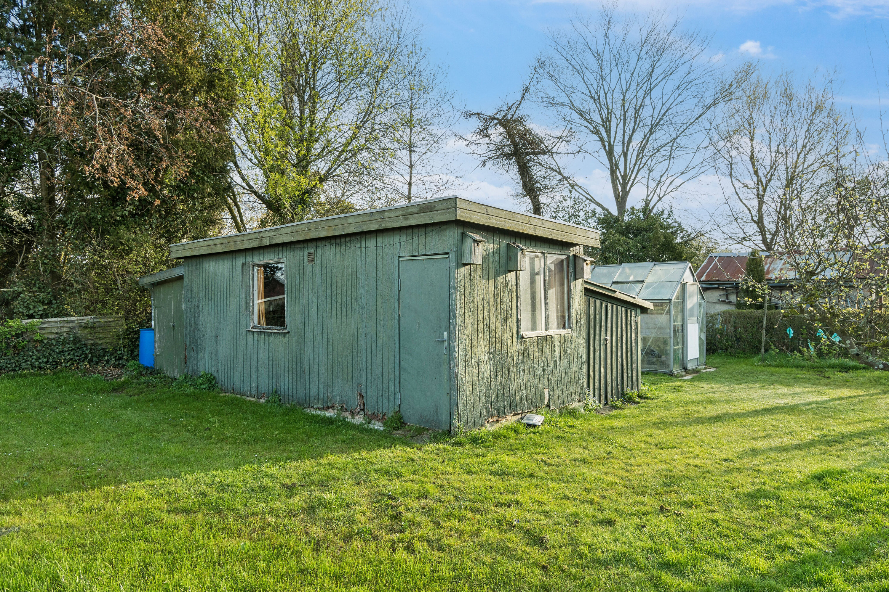 Fremhævet set fra haven billede i fuldskærmstilstand. Billede af Jasminvej 31, 4200 Slagelse