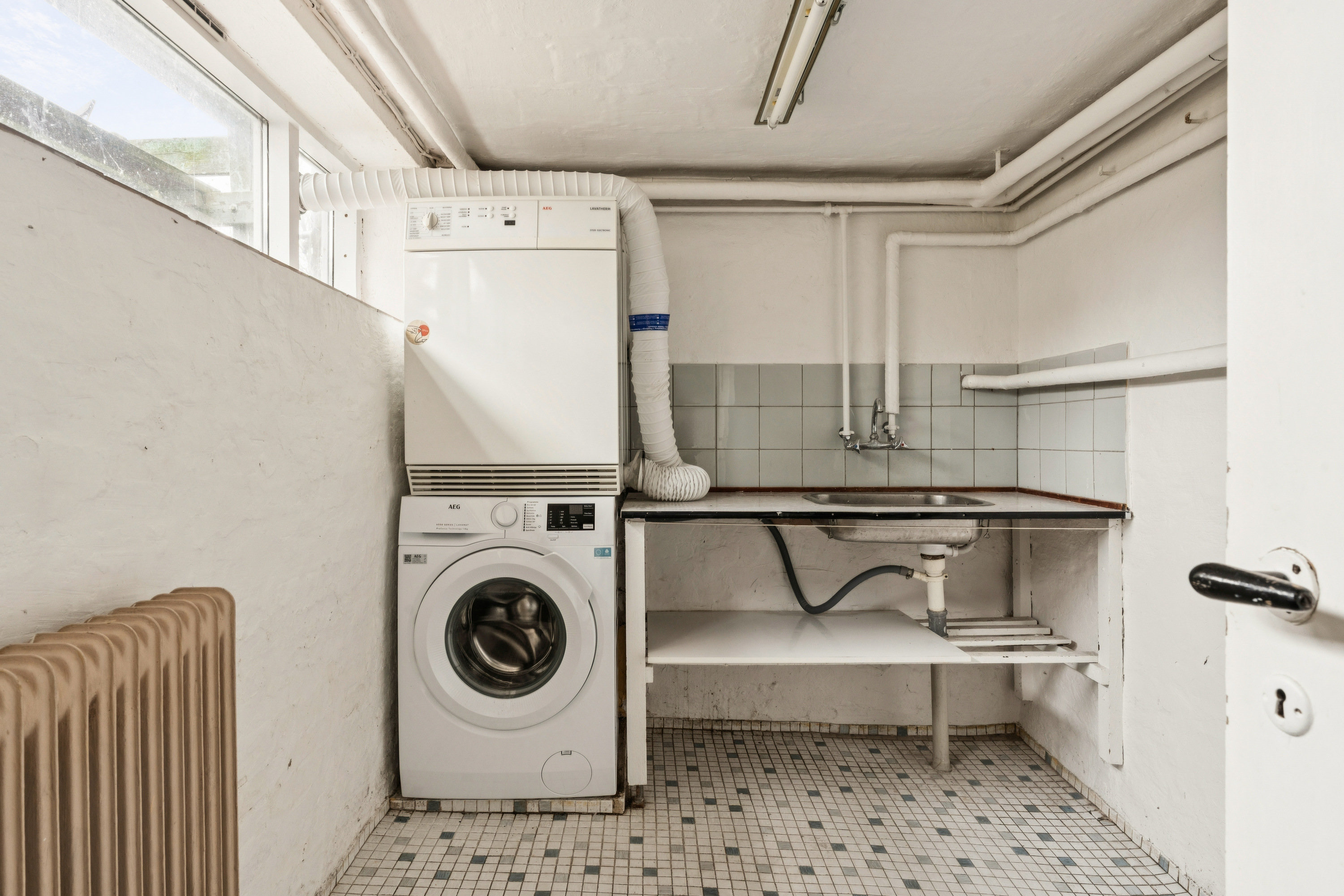 Fremhævet vaskerum billede i fuldskærmstilstand. Billede af Gærdesangervej 8, 9230 Svenstrup J