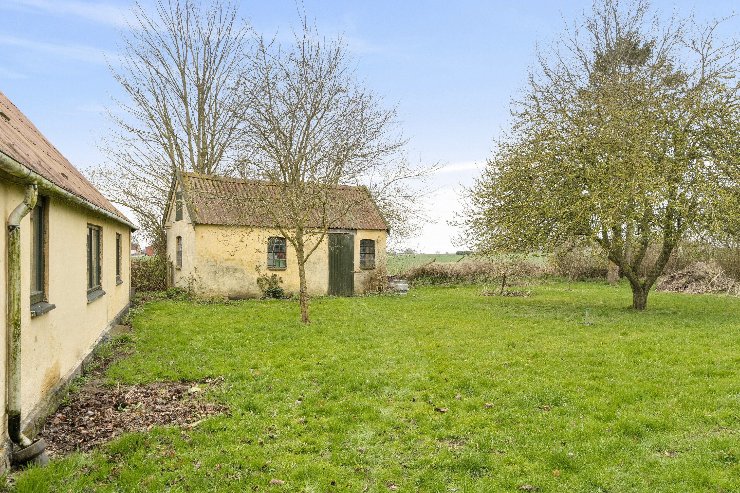 Fremhævet set fra haven billede i fuldskærmstilstand. Billede af Krænkerupvej 25, Havrebjerg, 4200 Slagelse