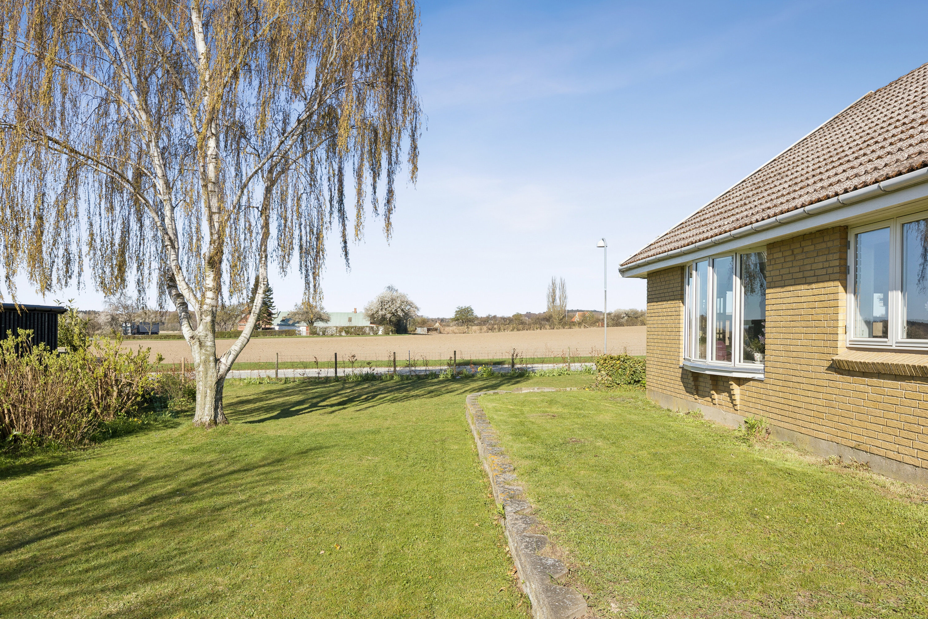 Fremhævet set fra haven billede i fuldskærmstilstand. Billede af Sundvej 3, Gl Kalvehave, 4771 Kalvehave