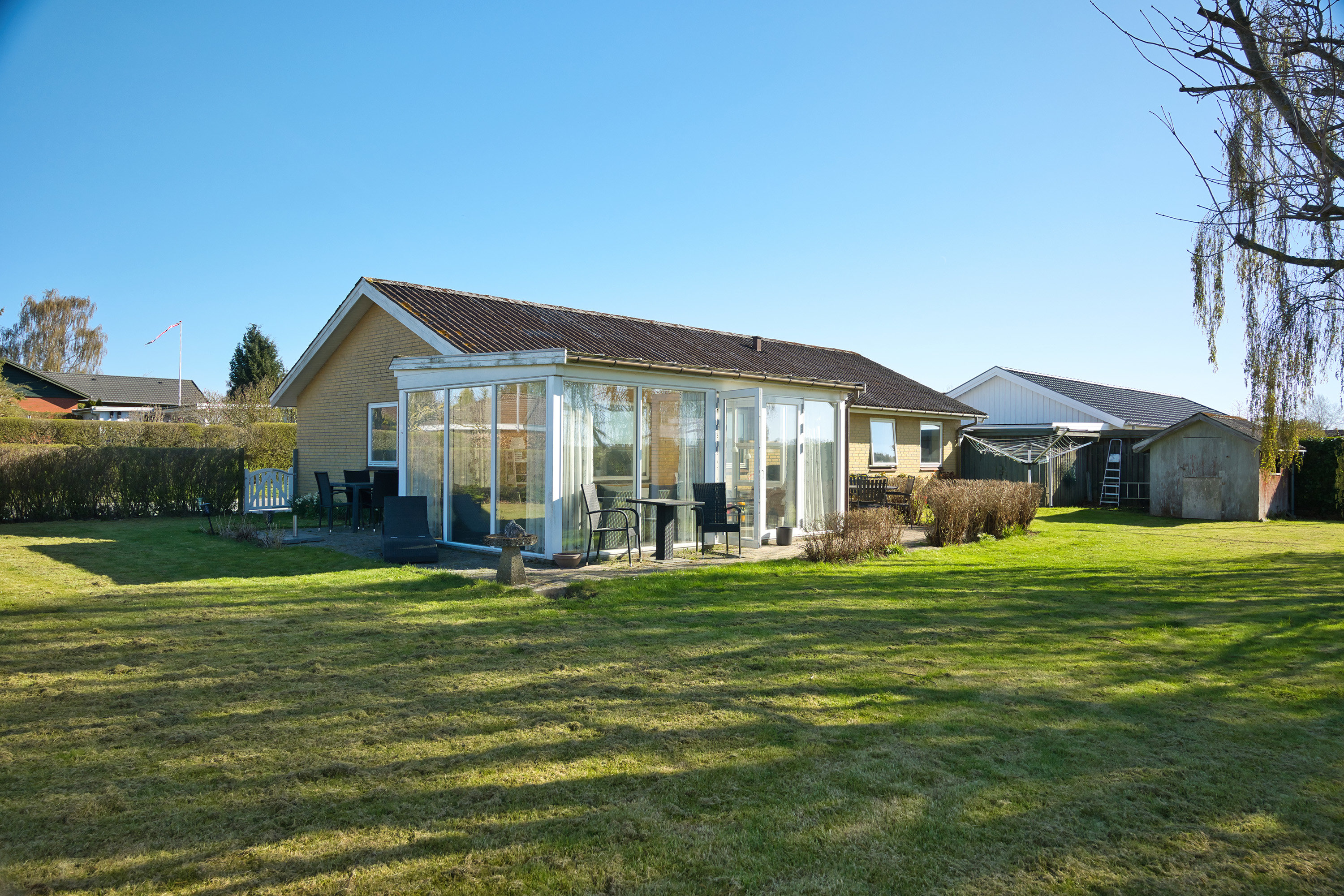 Fremhævet facade havesiden billede i fuldskærmstilstand. Billede af Engpibervej 29, 4930 Maribo