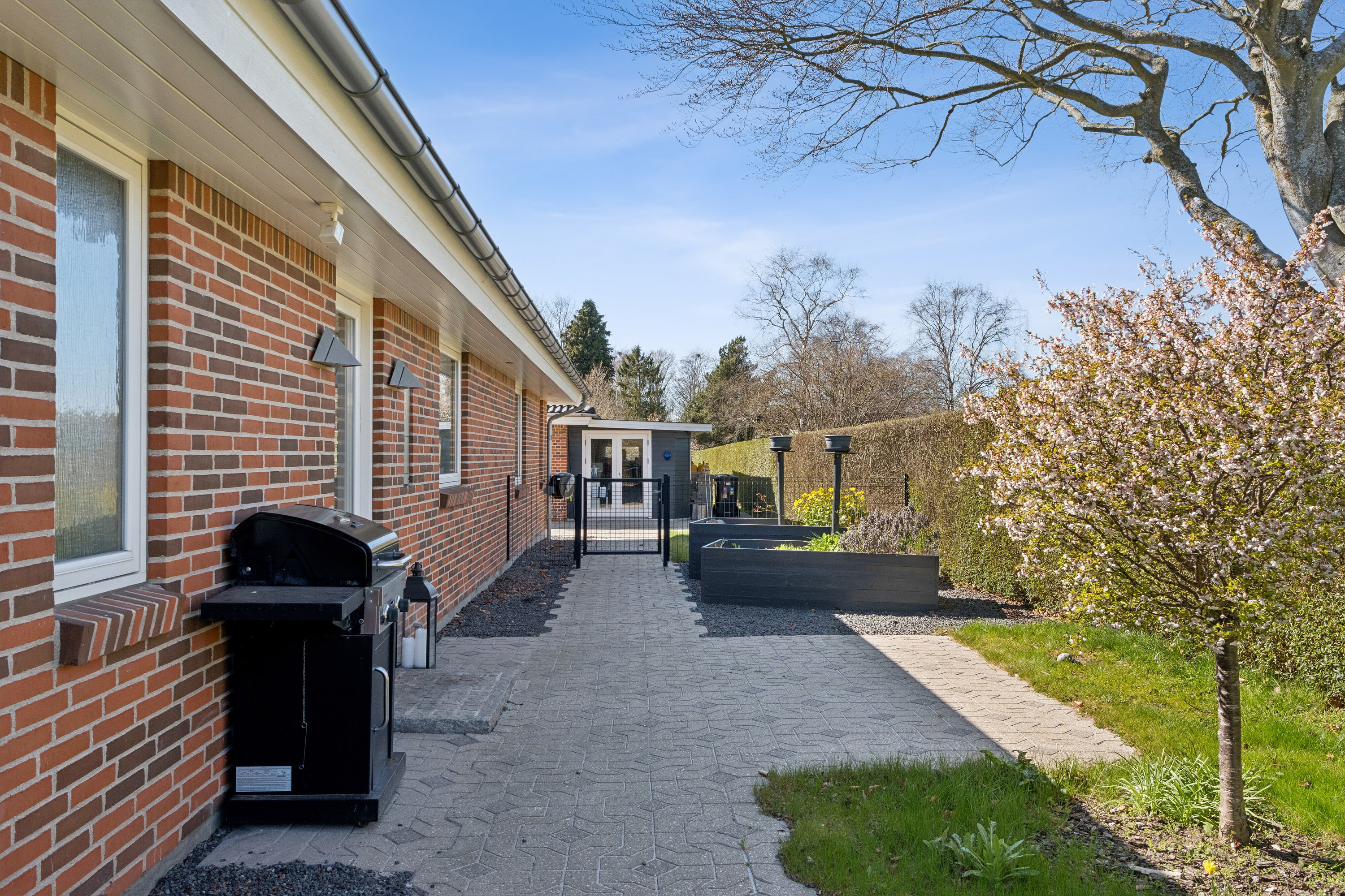 Fremhævet set fra haven billede i fuldskærmstilstand. Billede af Bytoften 16, Førslev, 4690 Haslev