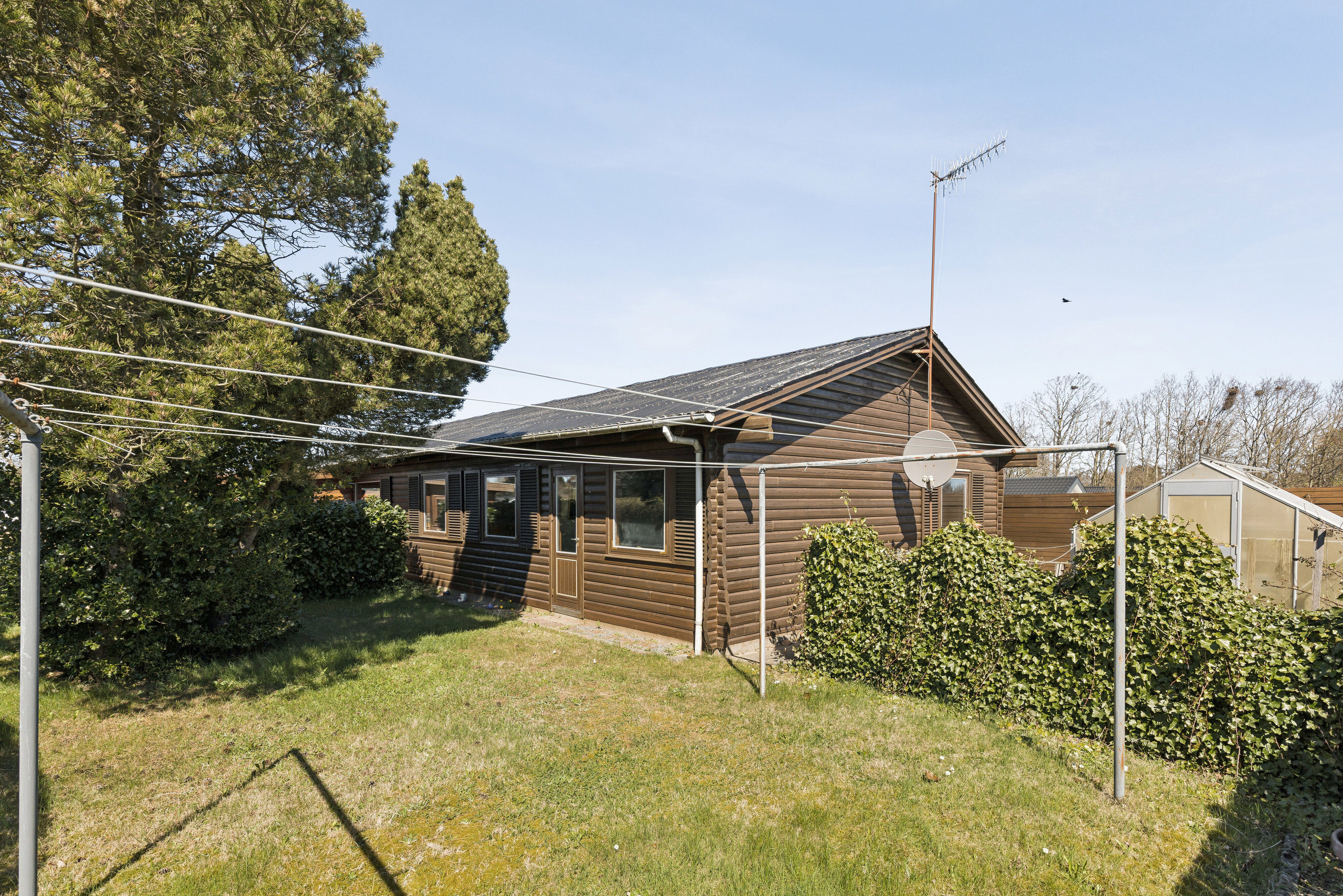 Fremhævet set fra haven billede i fuldskærmstilstand. Billede af Lynggårdsbakken 10, 4400 Kalundborg