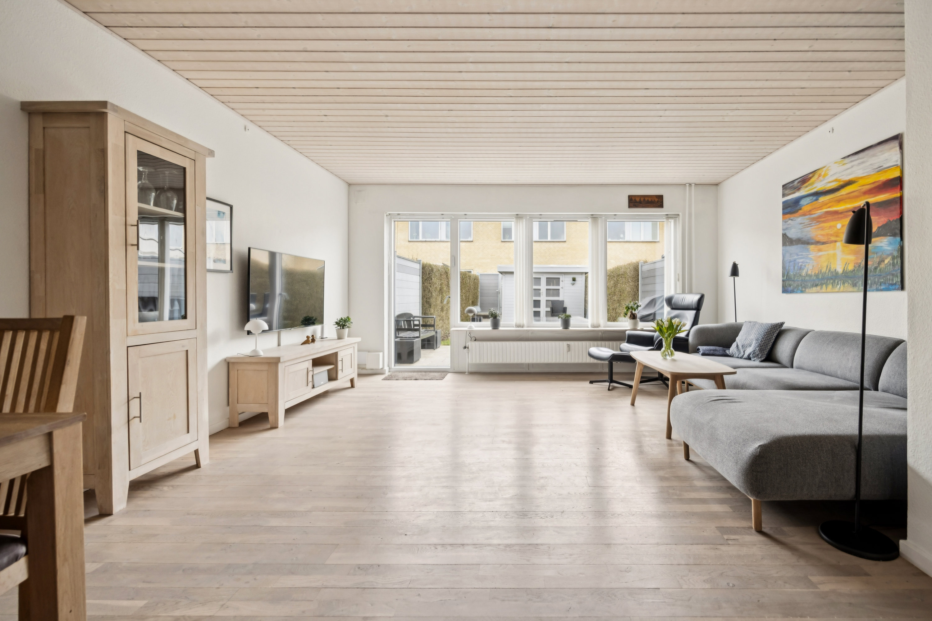 Fremhævet stue billede i fuldskærmstilstand. Billede af Lindholmsvej 89B, 9400 Nørresundby