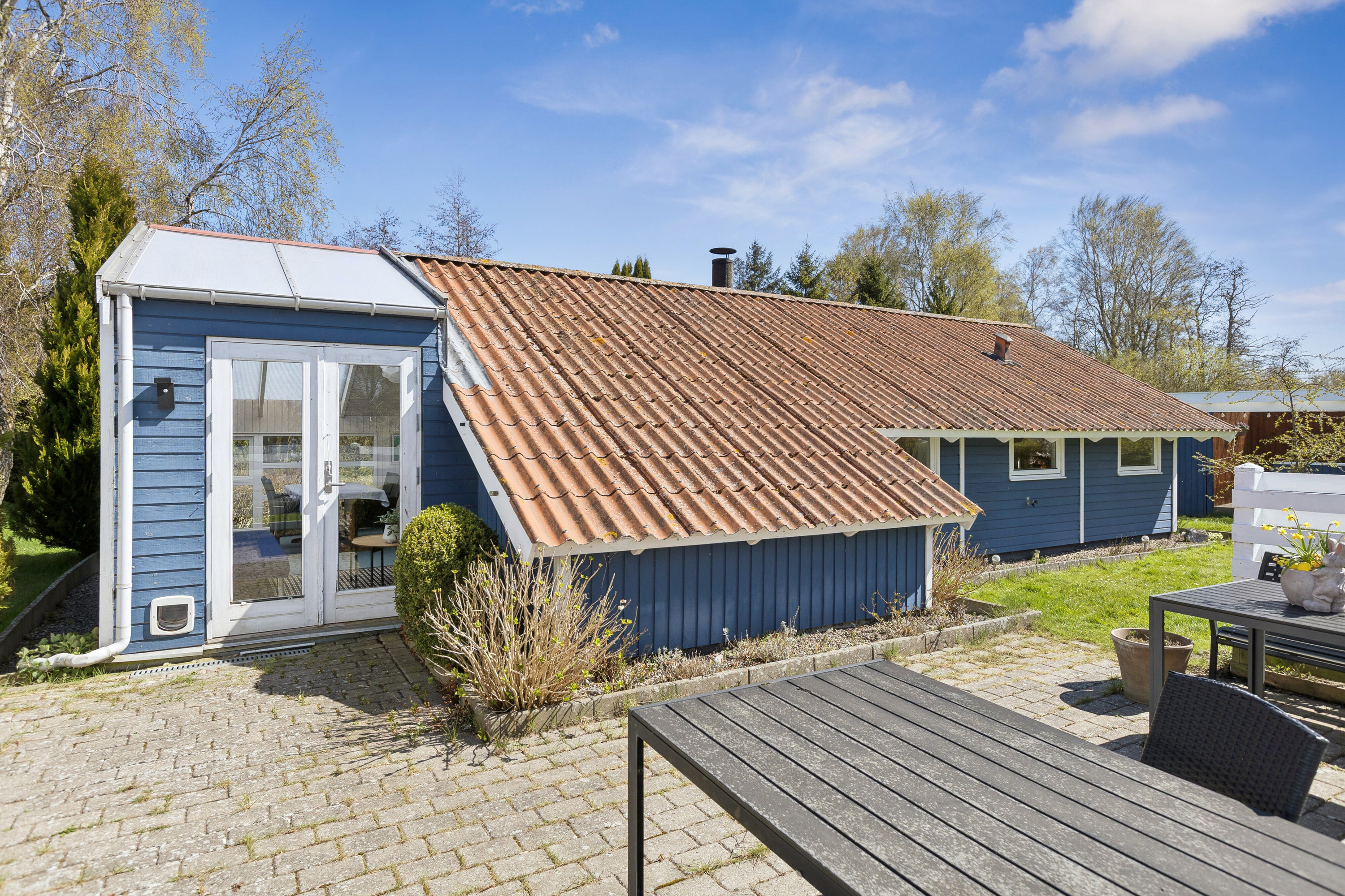 Fremhævet set fra haven billede i fuldskærmstilstand. Billede af Sandløbervej 21, 4760 Vordingborg