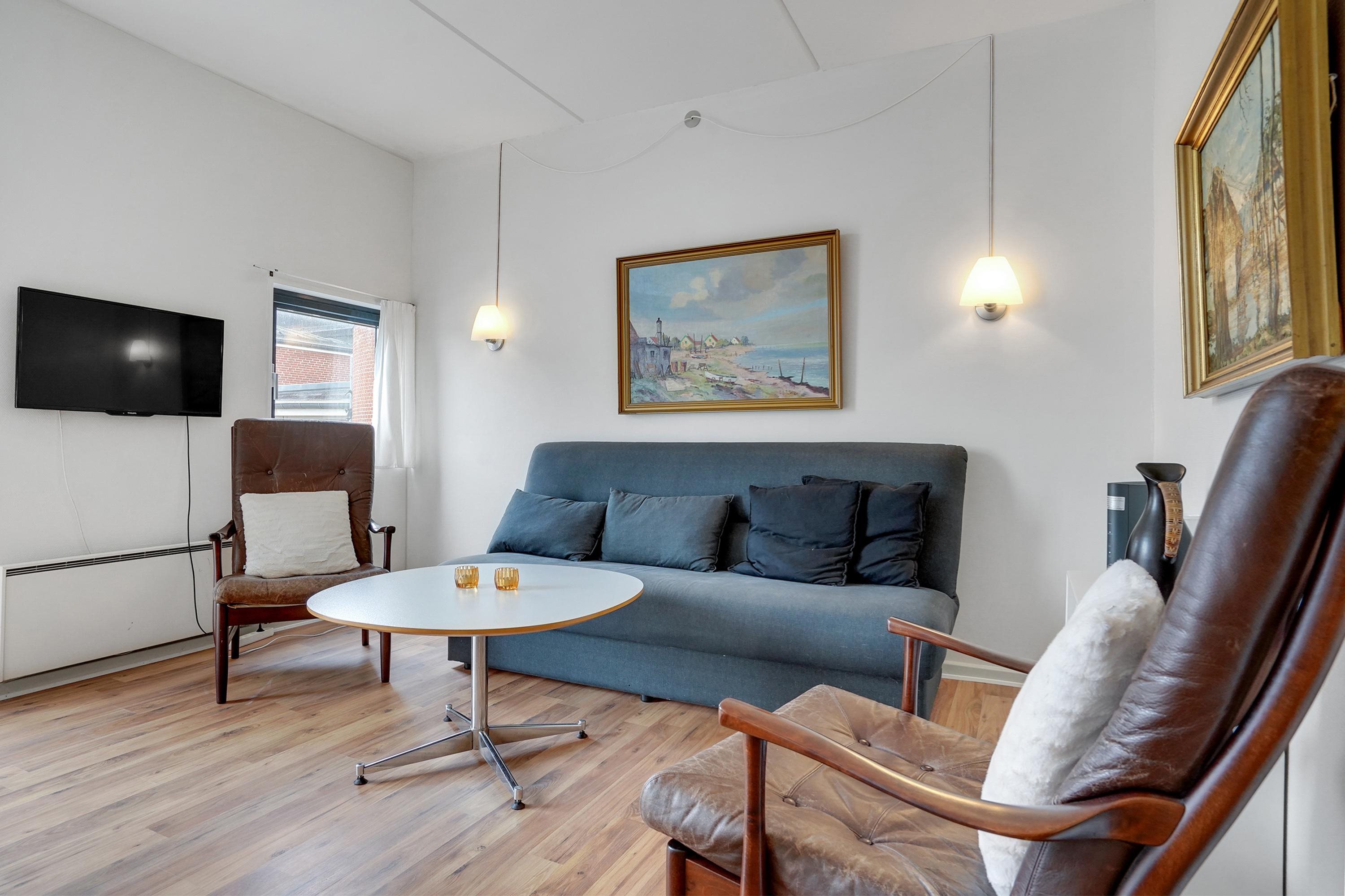 Fremhævet stue billede i fuldskærmstilstand. Billede af Strandvejen 52, st.. 55., Fanø Bad, 6720 Fanø