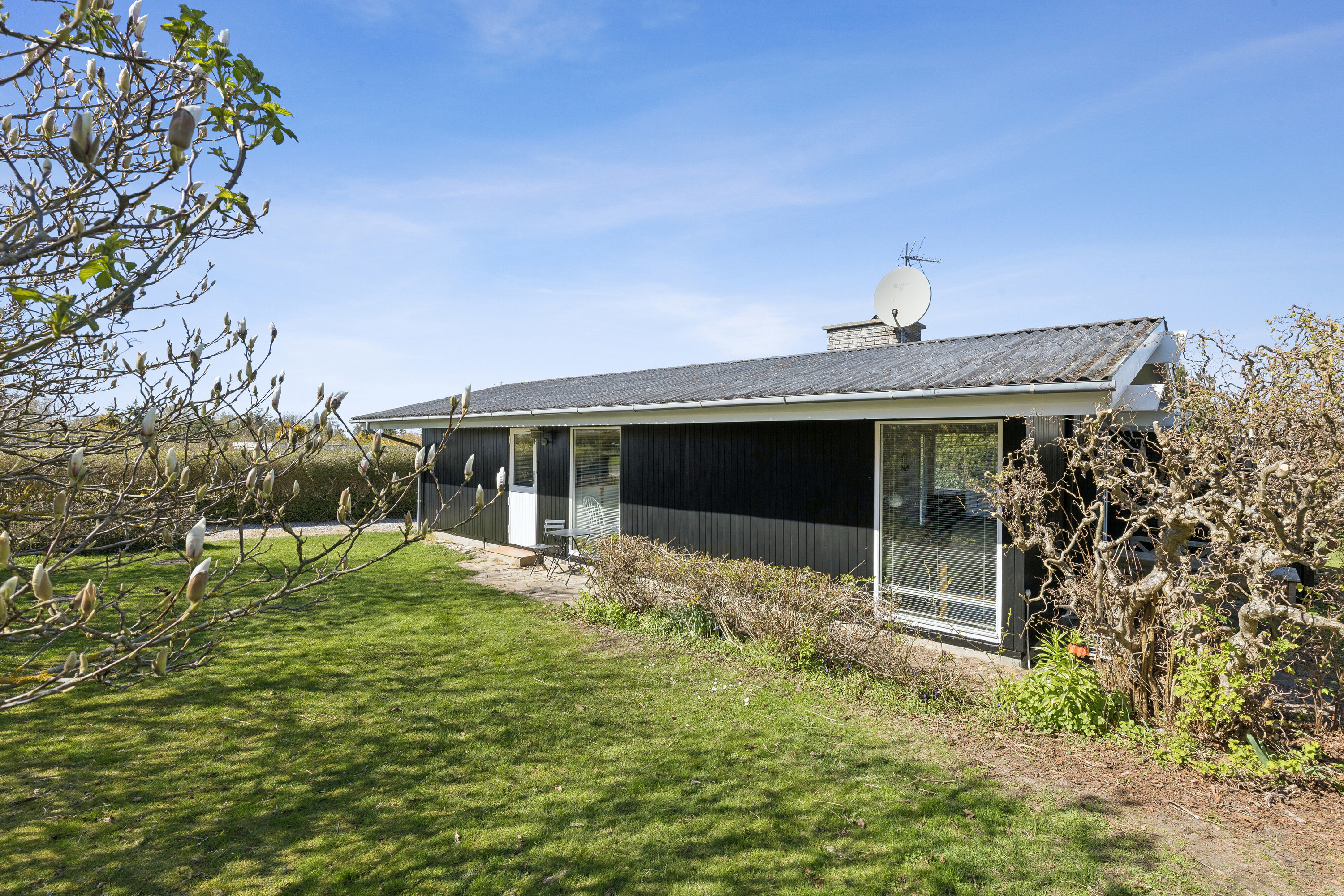 Fremhævet set fra haven billede i fuldskærmstilstand. Billede af Delfivej 11, Drøsselbjerg, 4200 Slagelse