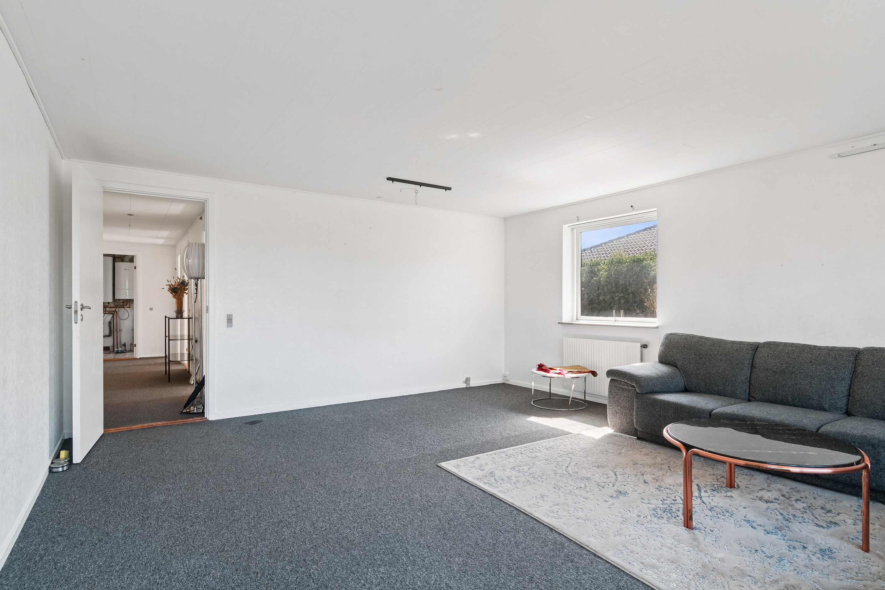 Fremhævet stue billede i fuldskærmstilstand. Billede af Præstefælledvej 30, 2770 Kastrup