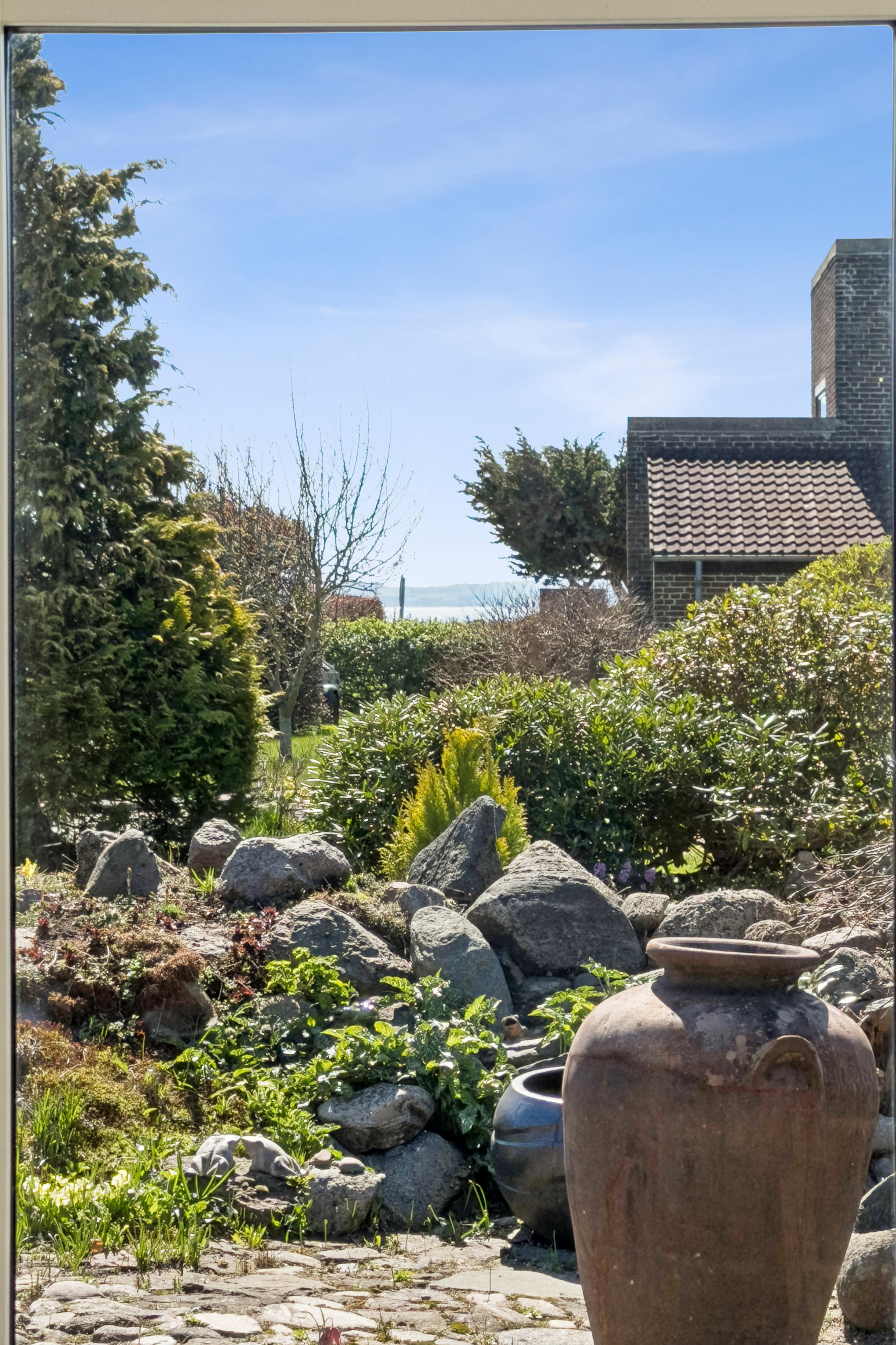 Fremhævet have billede i fuldskærmstilstand. Billede af Rosenhøjvej 22, Ugelbølle, 8410 Rønde