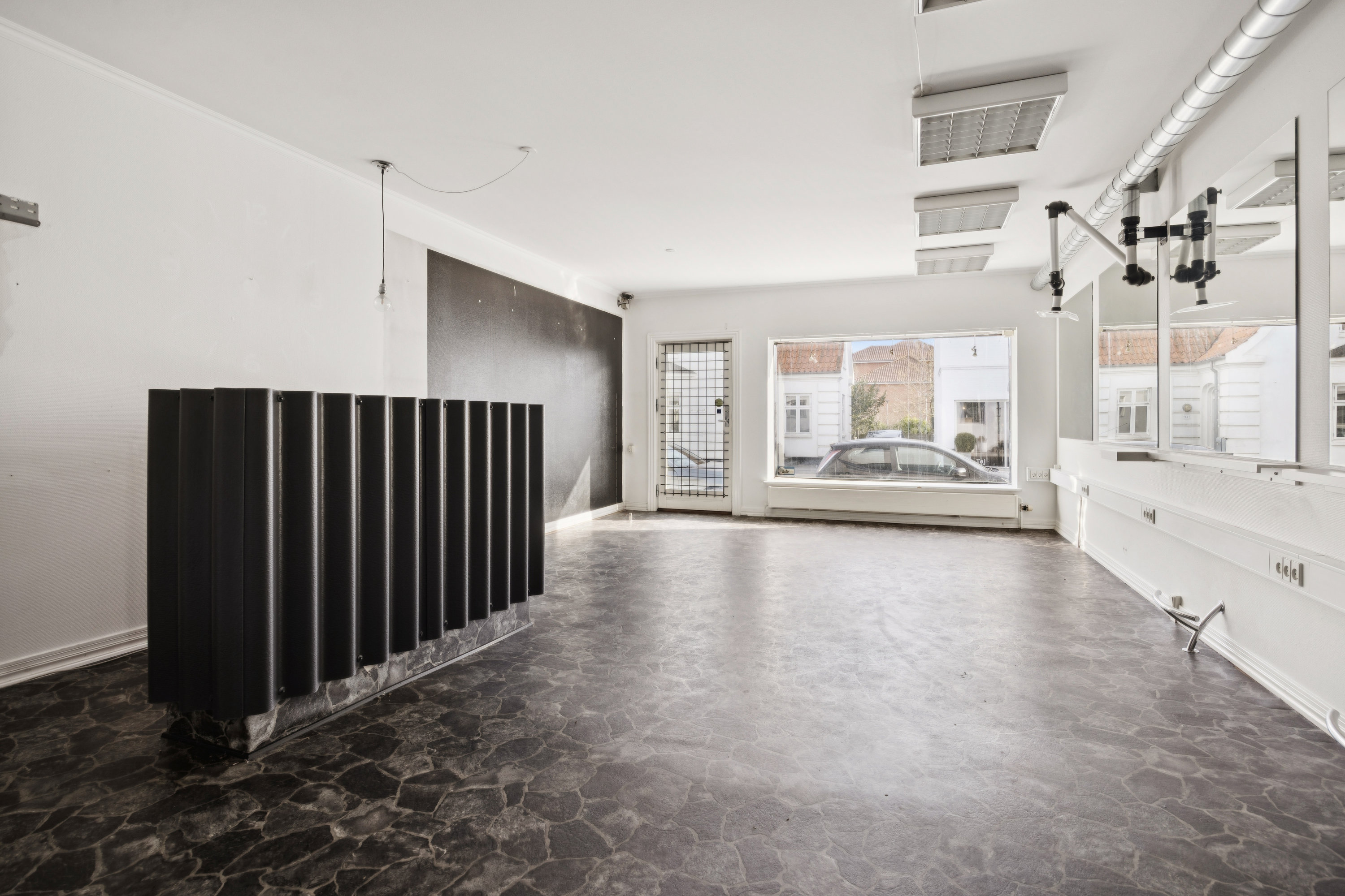 Fremhævet stue billede i fuldskærmstilstand. Billede af Østergade 15, 9320 Hjallerup