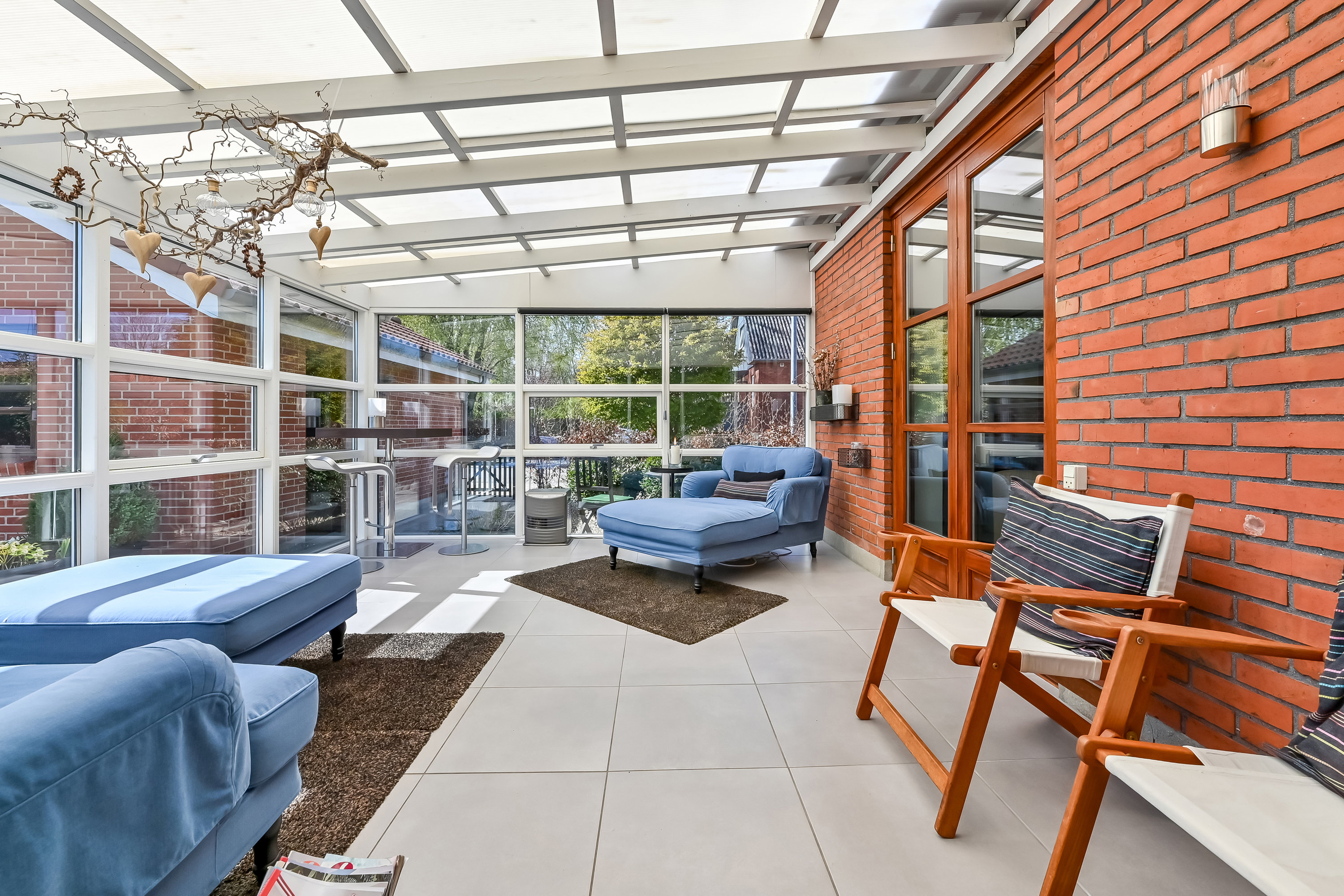 Fremhævet udestue billede i fuldskærmstilstand. Billede af Nøddevej 22, 7451 Sunds