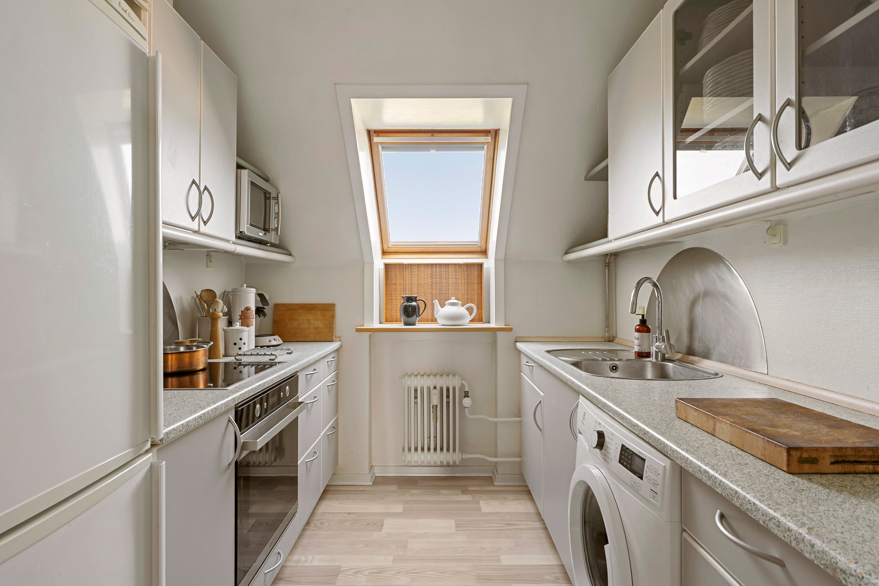 Fremhævet køkken billede i fuldskærmstilstand. Billede af Havepladsvej 152, 2. tv., 7000 Fredericia