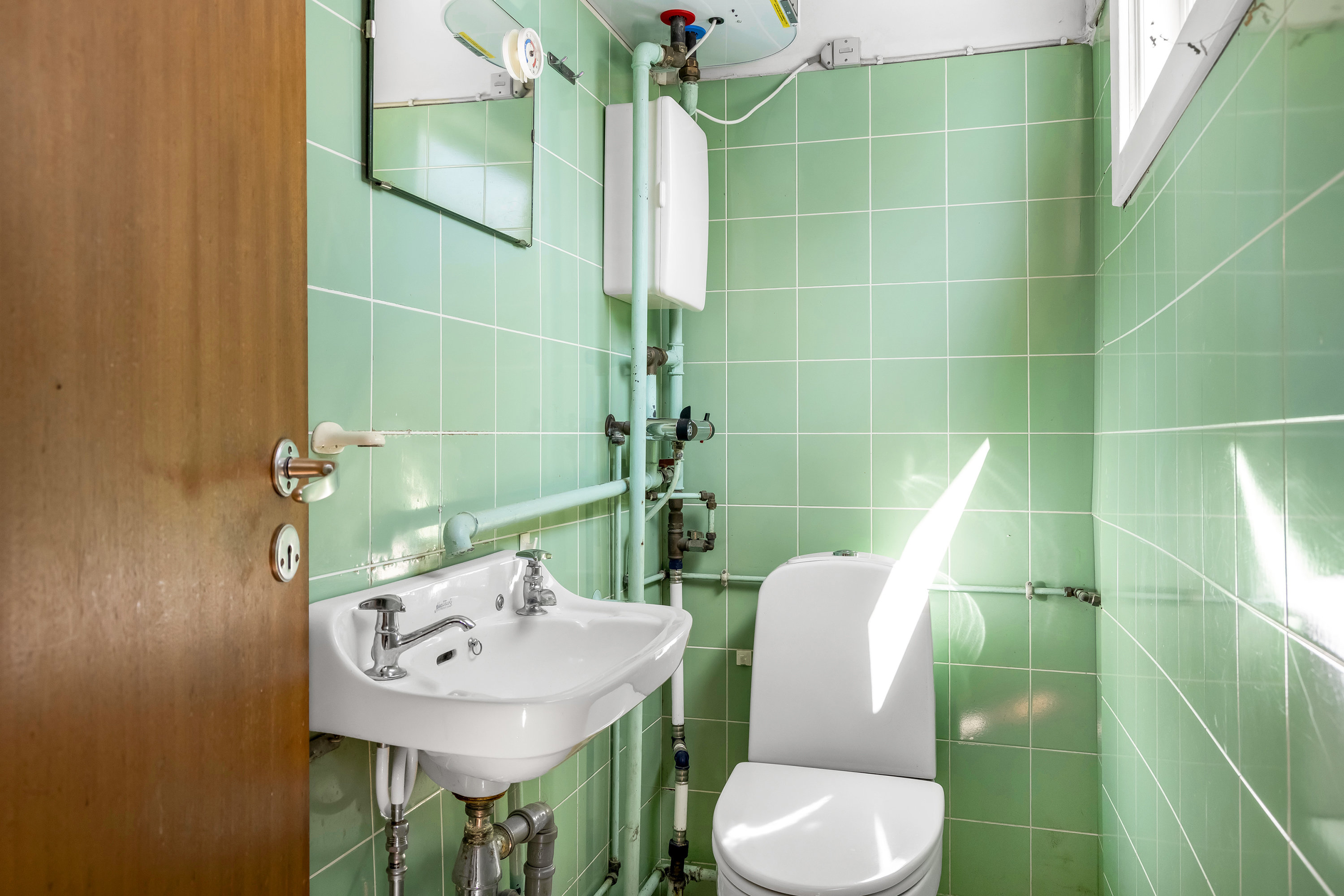 Fremhævet badeværelse billede i fuldskærmstilstand. Billede af Markskellet 6, 3210 Vejby