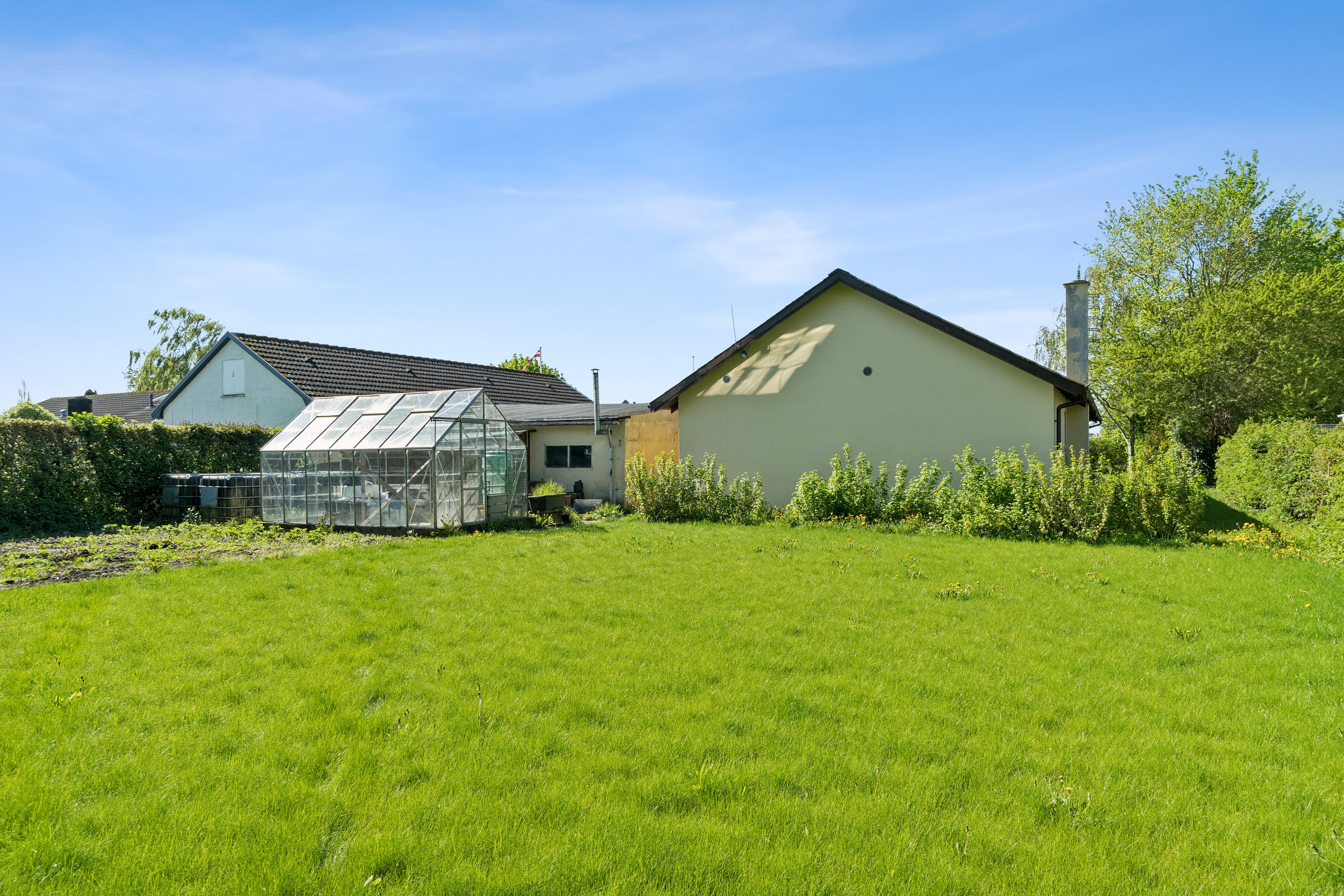 Fremhævet set fra haven billede i fuldskærmstilstand. Billede af Sørby Hovedgade 9, Sørbymagle, 4200 Slagelse