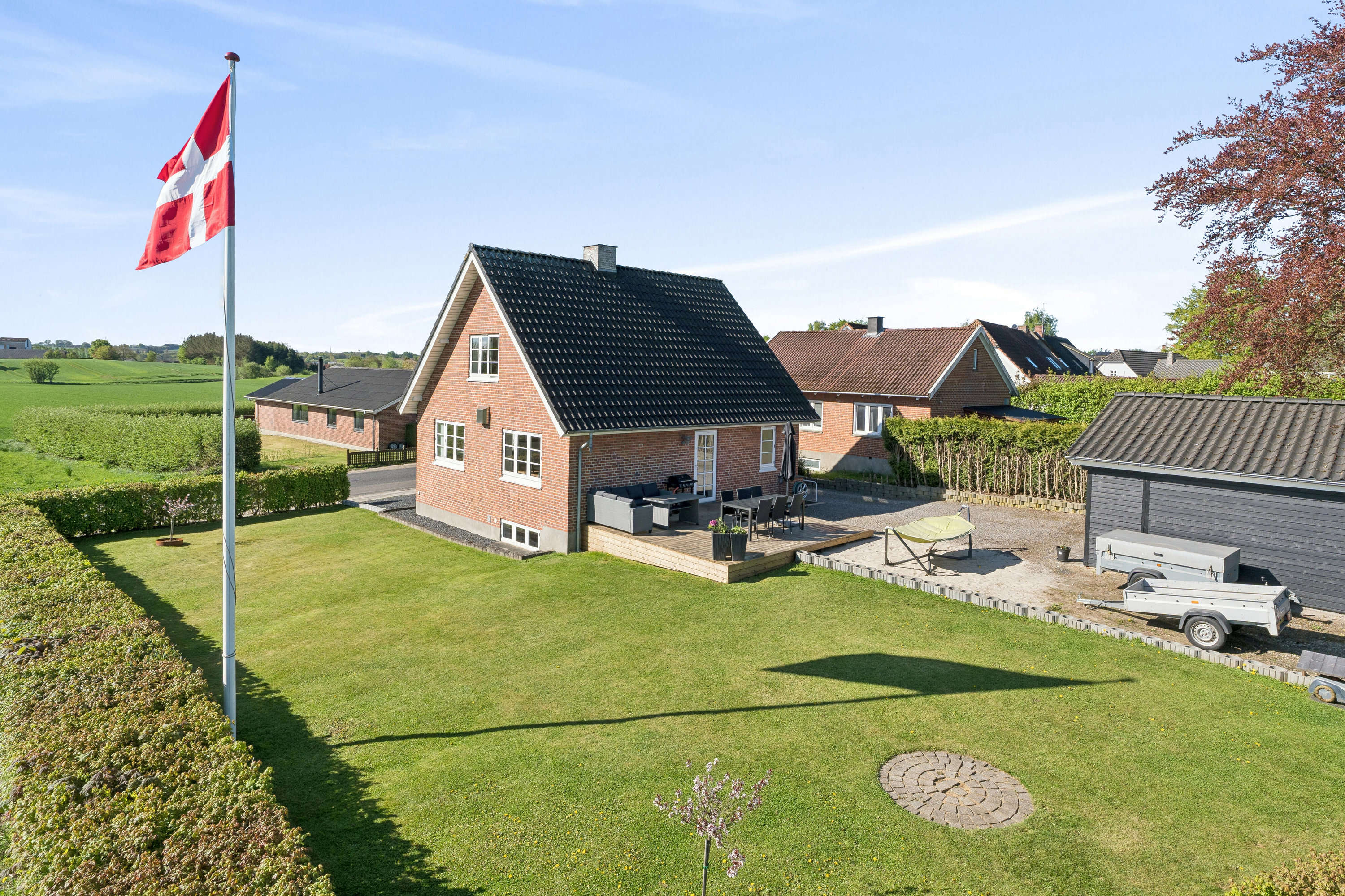 Fremhævet set fra haven billede i fuldskærmstilstand. Billede af Vinderslevvej 57, Vinderslev, 8620 Kjellerup