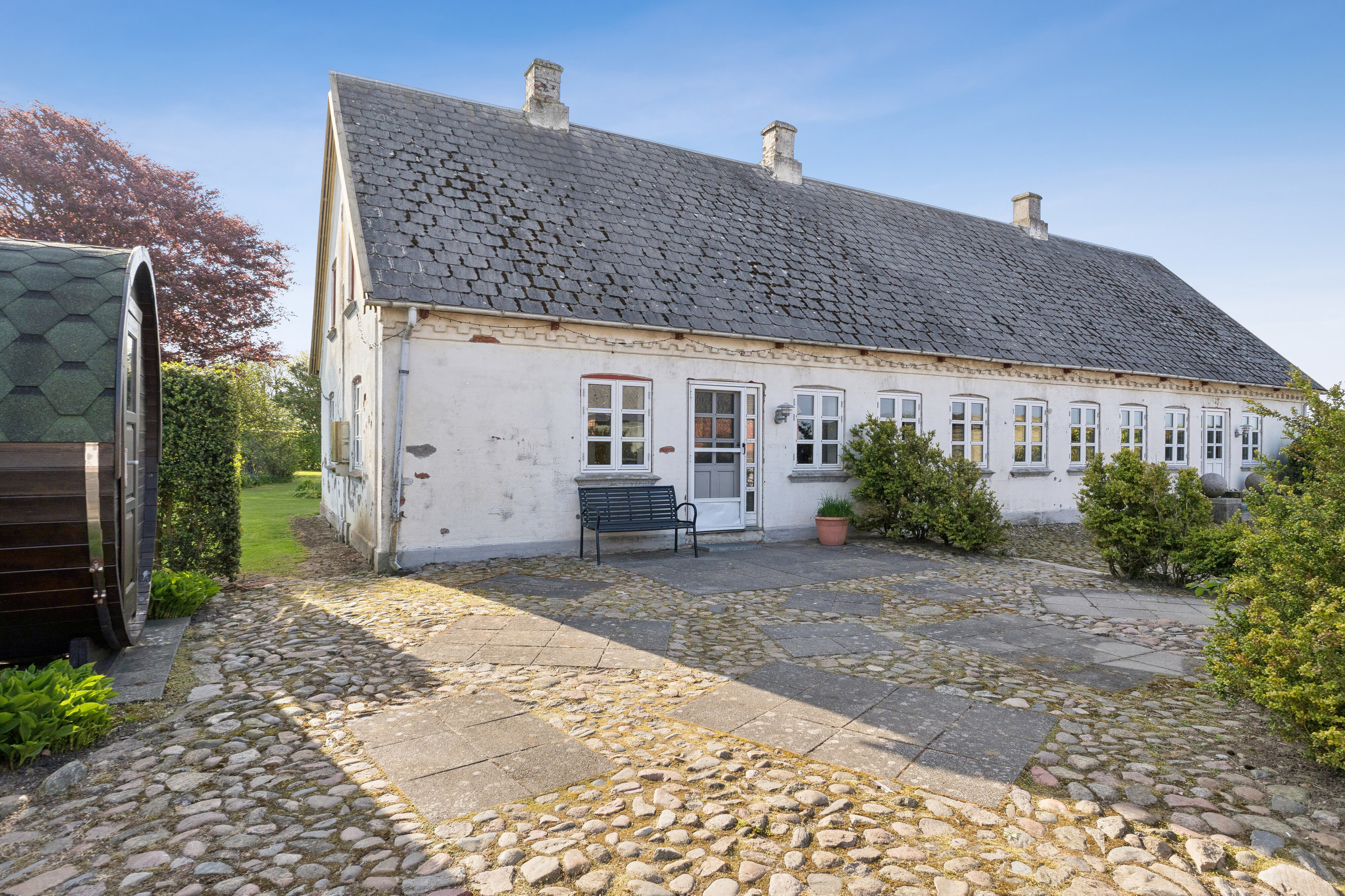 Fremhævet udendørs billede i fuldskærmstilstand. Billede af Haugevej 18, Skovhus, 8620 Kjellerup