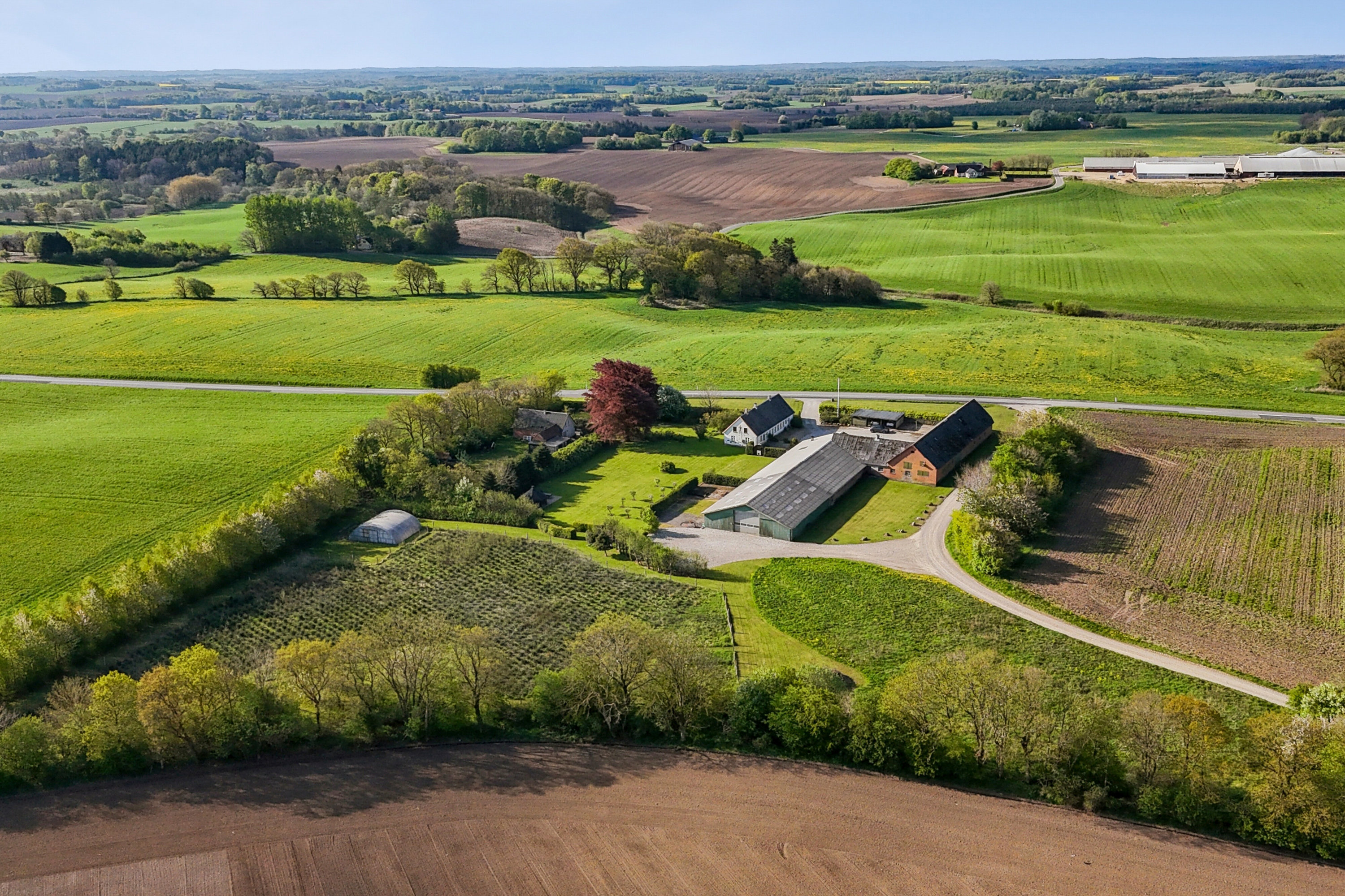 Fremhævet luftfoto billede i fuldskærmstilstand. Billede af Haugevej 18, Skovhus, 8620 Kjellerup