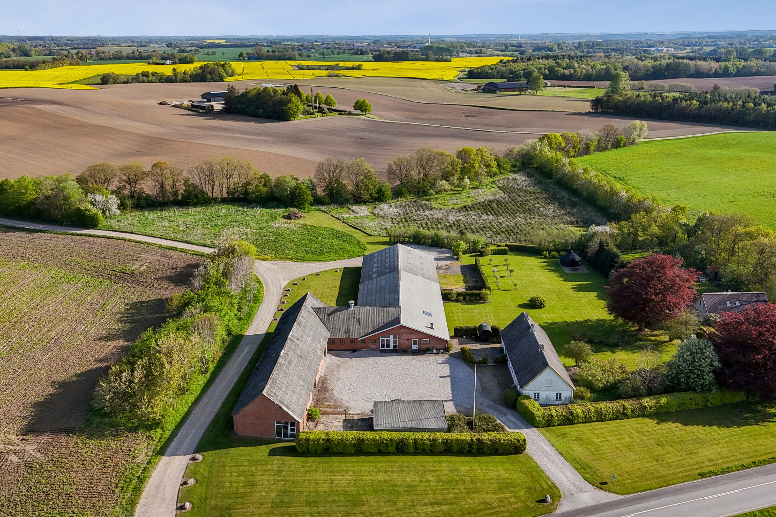 Fremhævet luftfoto billede i fuldskærmstilstand. Billede af Haugevej 18, Skovhus, 8620 Kjellerup