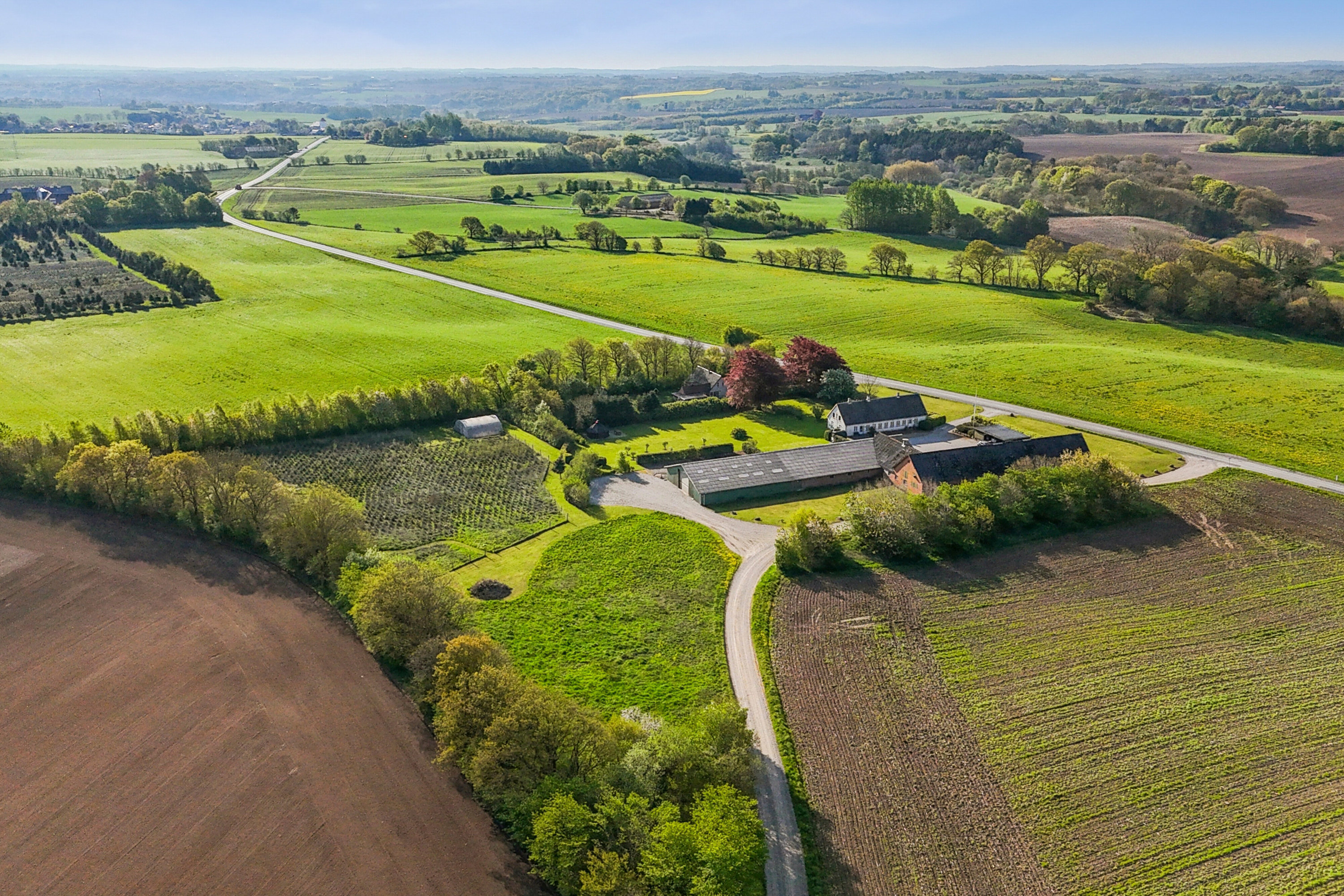 Fremhævet luftfoto billede i fuldskærmstilstand. Billede af Haugevej 18, Skovhus, 8620 Kjellerup