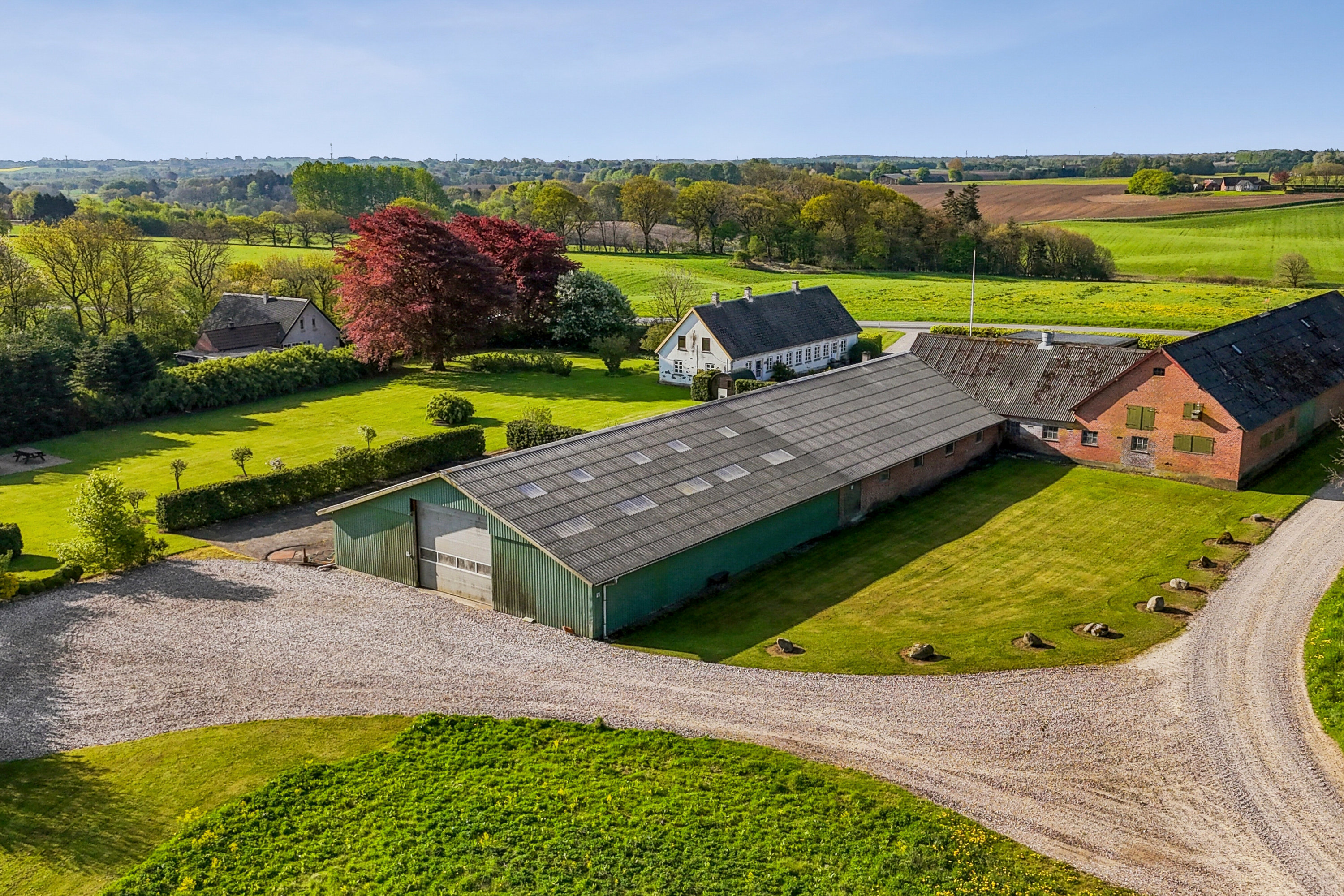 Fremhævet luftfoto billede i fuldskærmstilstand. Billede af Haugevej 18, Skovhus, 8620 Kjellerup