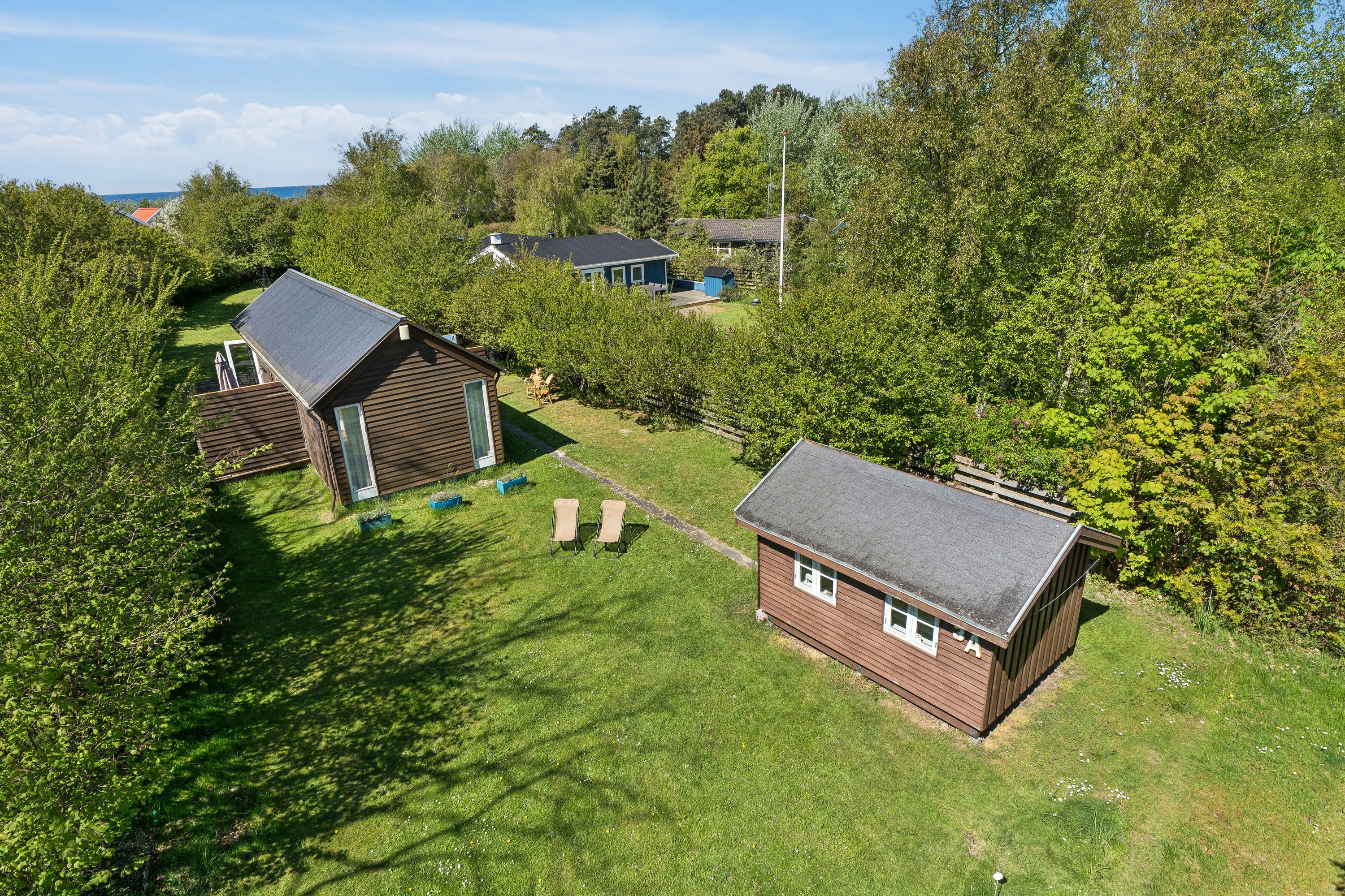 Fremhævet set fra haven billede i fuldskærmstilstand. Billede af Ristinge-Vejle Ejerl 3A, Ristinge, 5932 Humble