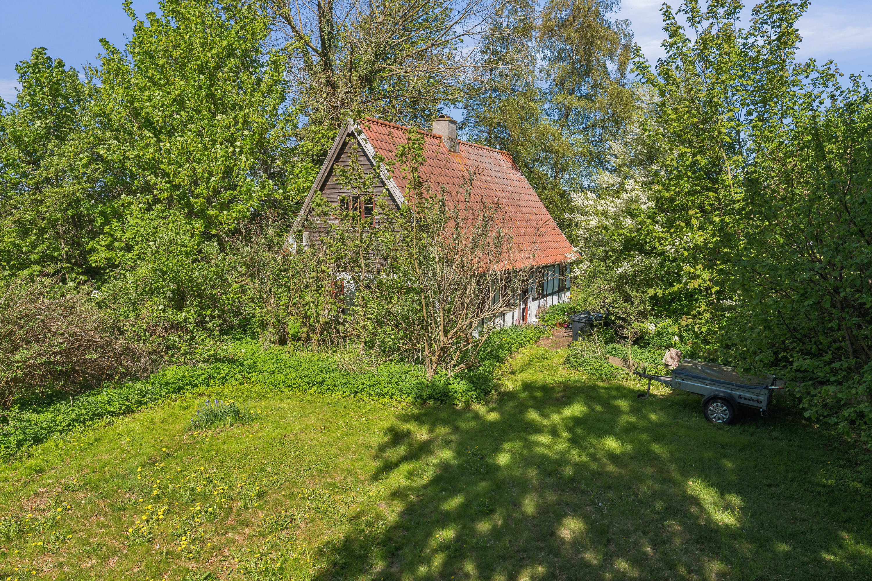 Fremhævet set fra haven billede i fuldskærmstilstand. Billede af Bækvænget 8, Refsvindinge, 5853 Ørbæk
