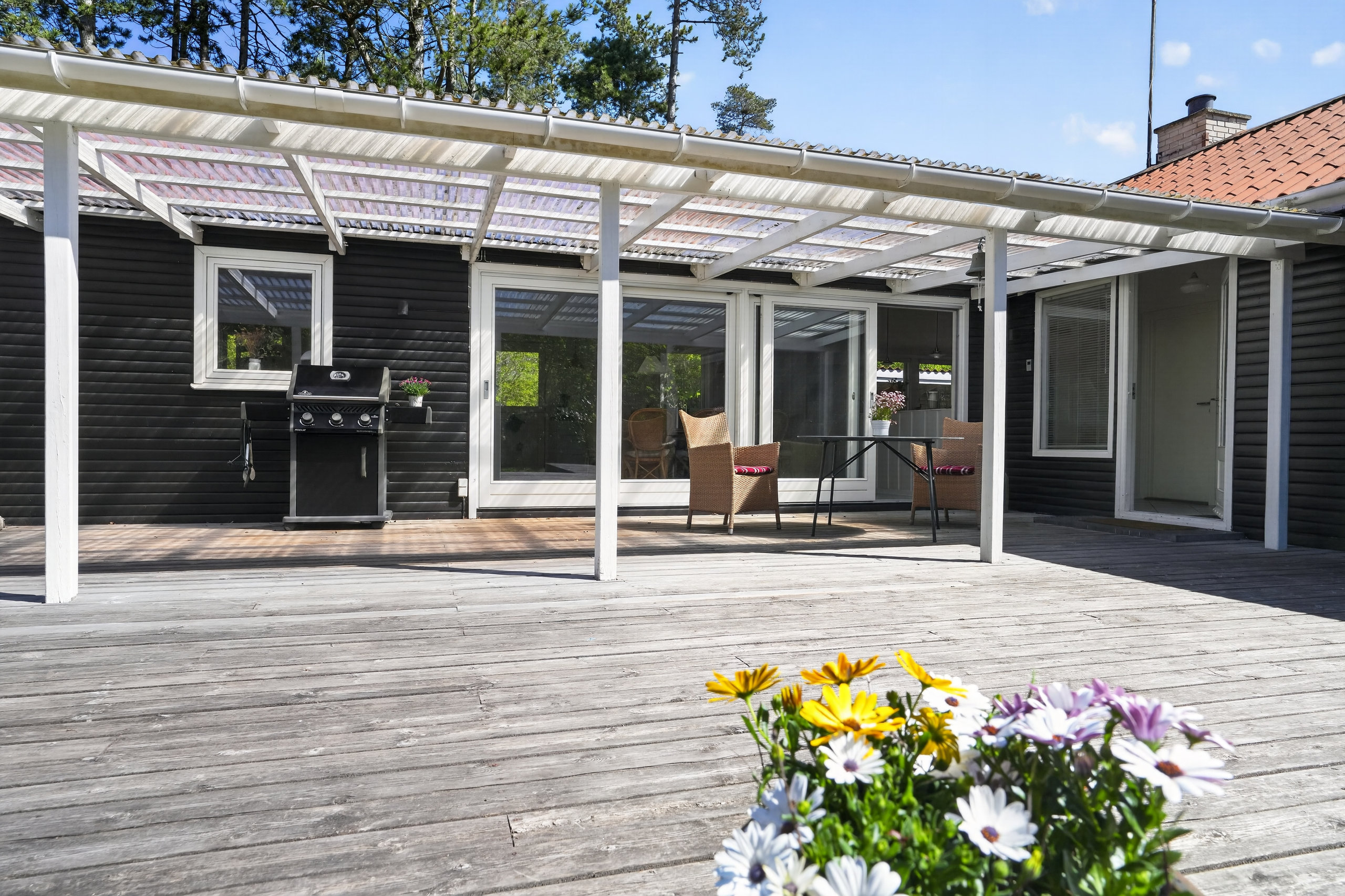 Fremhævet terrasse billede i fuldskærmstilstand. Billede af Peter Andersensvej 18, Ebbeløkke, 4500 Nykøbing Sj