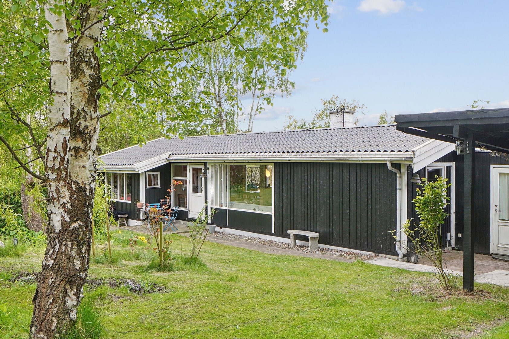 Fremhævet set fra haven billede i fuldskærmstilstand. Billede af Anna Borgsvej 7, Evetofte, 3370 Melby