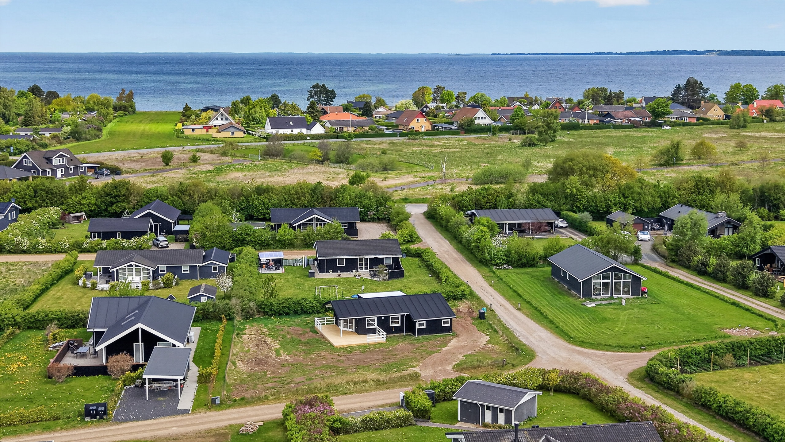 Fremhævet luftfoto billede i fuldskærmstilstand. Billede af Ravnholt 20, Havnsø, 4591 Føllenslev