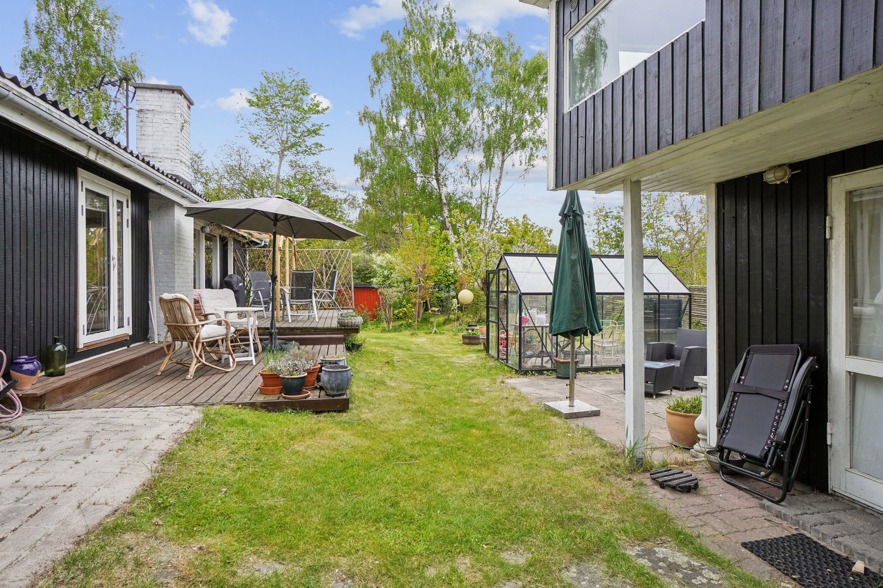 Fremhævet set fra haven billede i fuldskærmstilstand. Billede af Anna Borgsvej 7, Evetofte, 3370 Melby