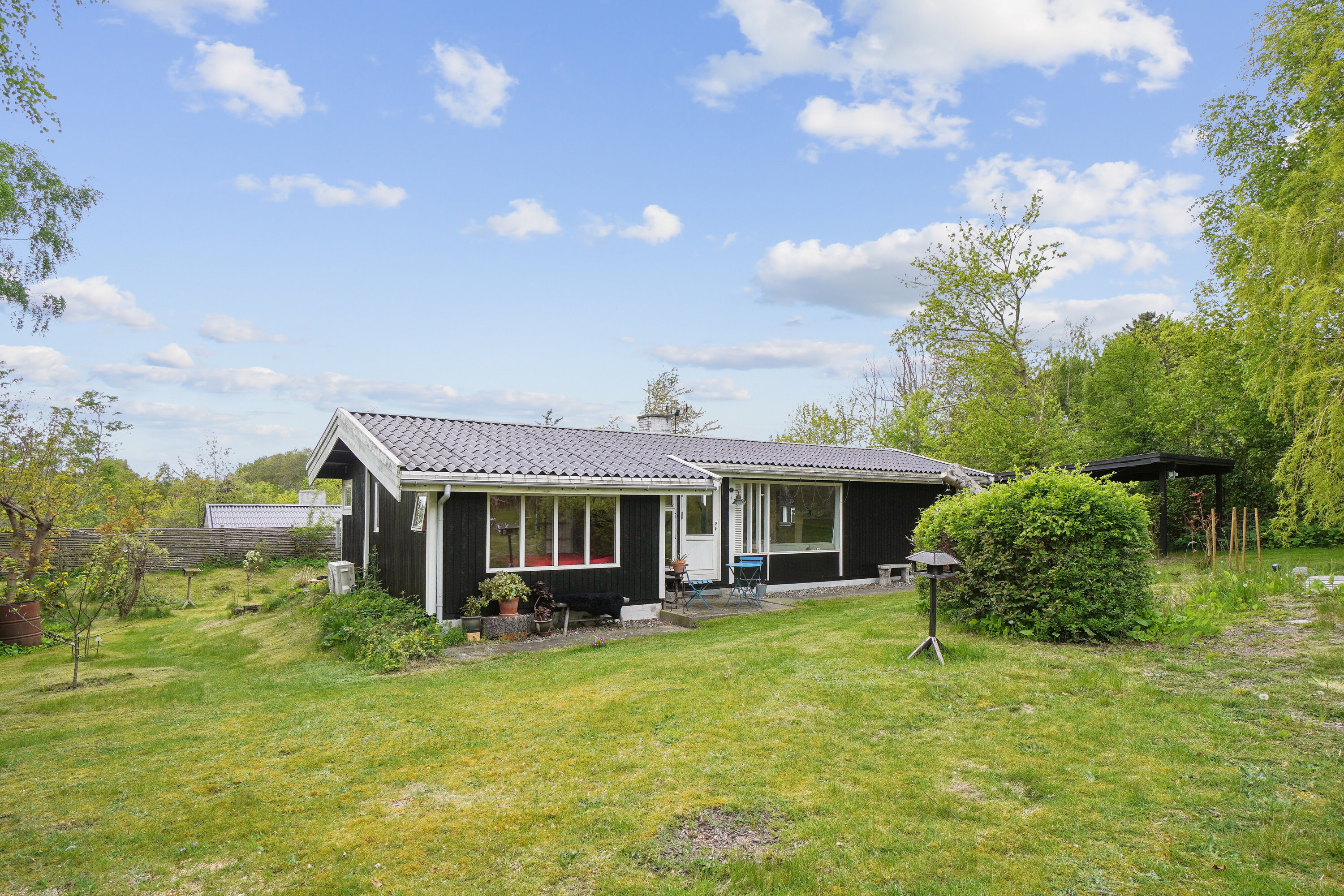 Fremhævet set fra haven billede i fuldskærmstilstand. Billede af Anna Borgsvej 7, Evetofte, 3370 Melby