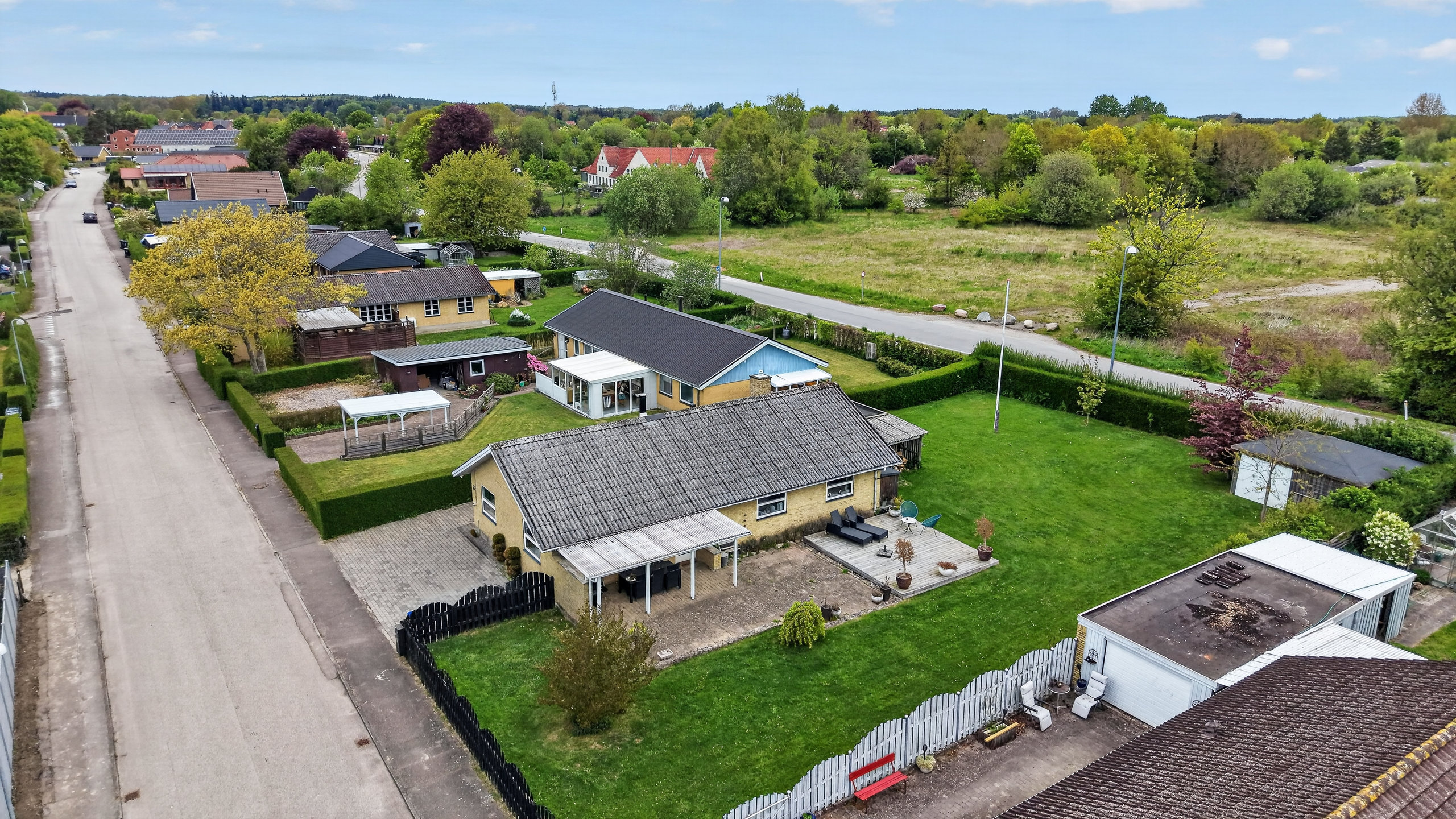 Fremhævet luftfoto billede i fuldskærmstilstand. Billede af Idrætsvej 27, Undløse, 4340 Tølløse