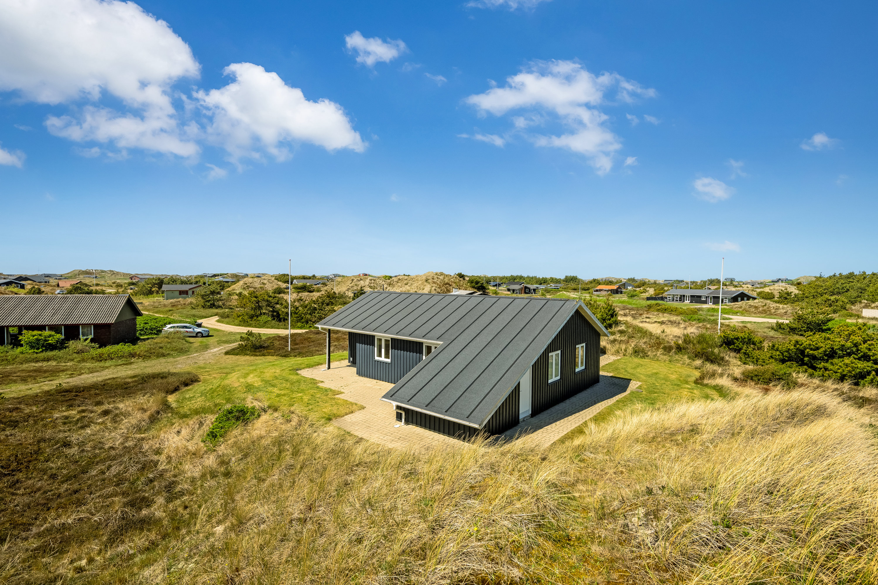 Fremhævet facade billede i fuldskærmstilstand. Billede af Marehalmen 31, Søndervig, 6950 Ringkøbing