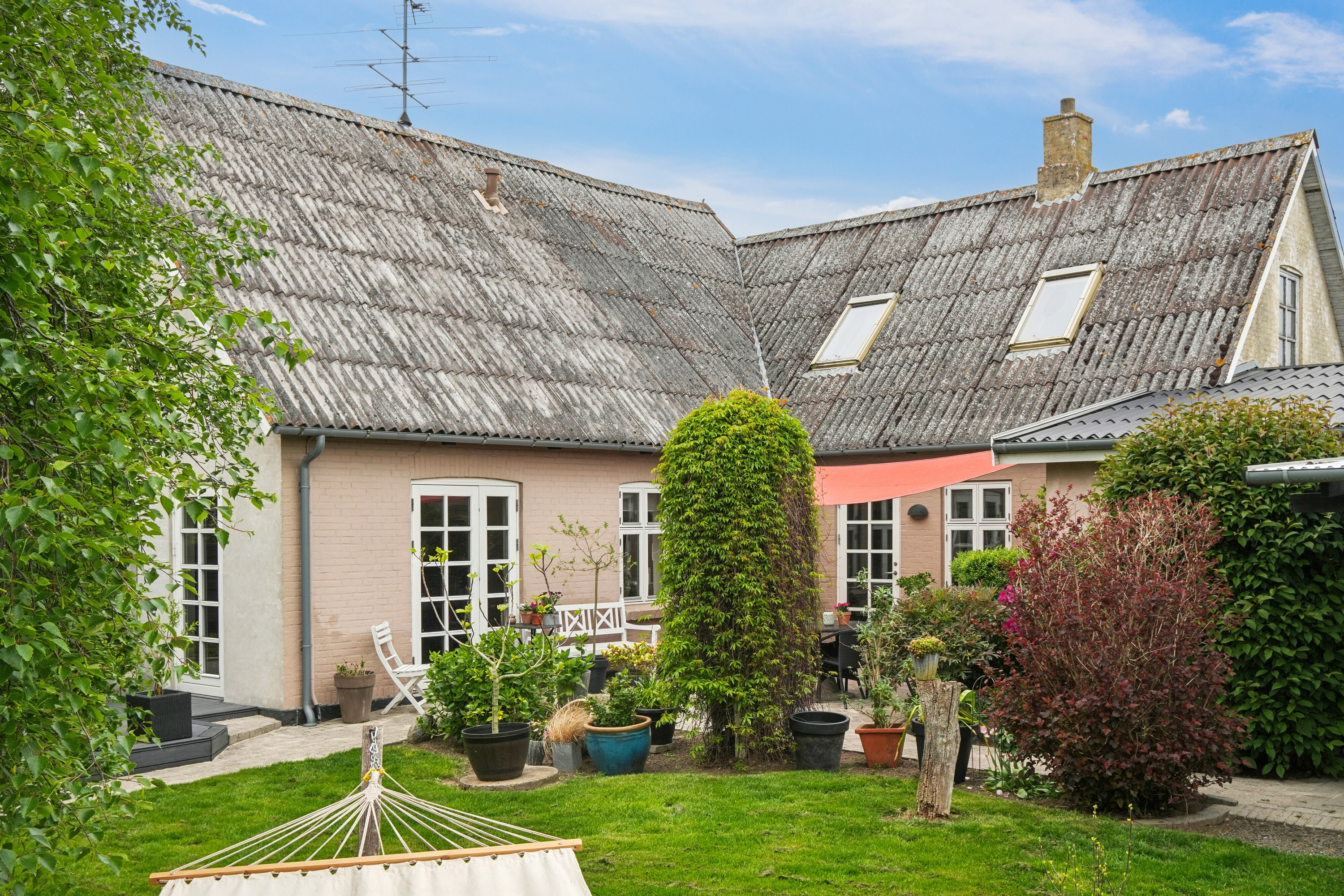 Fremhævet set fra haven billede i fuldskærmstilstand. Billede af Søndre Landevej 27, Henninge, 5900 Rudkøbing