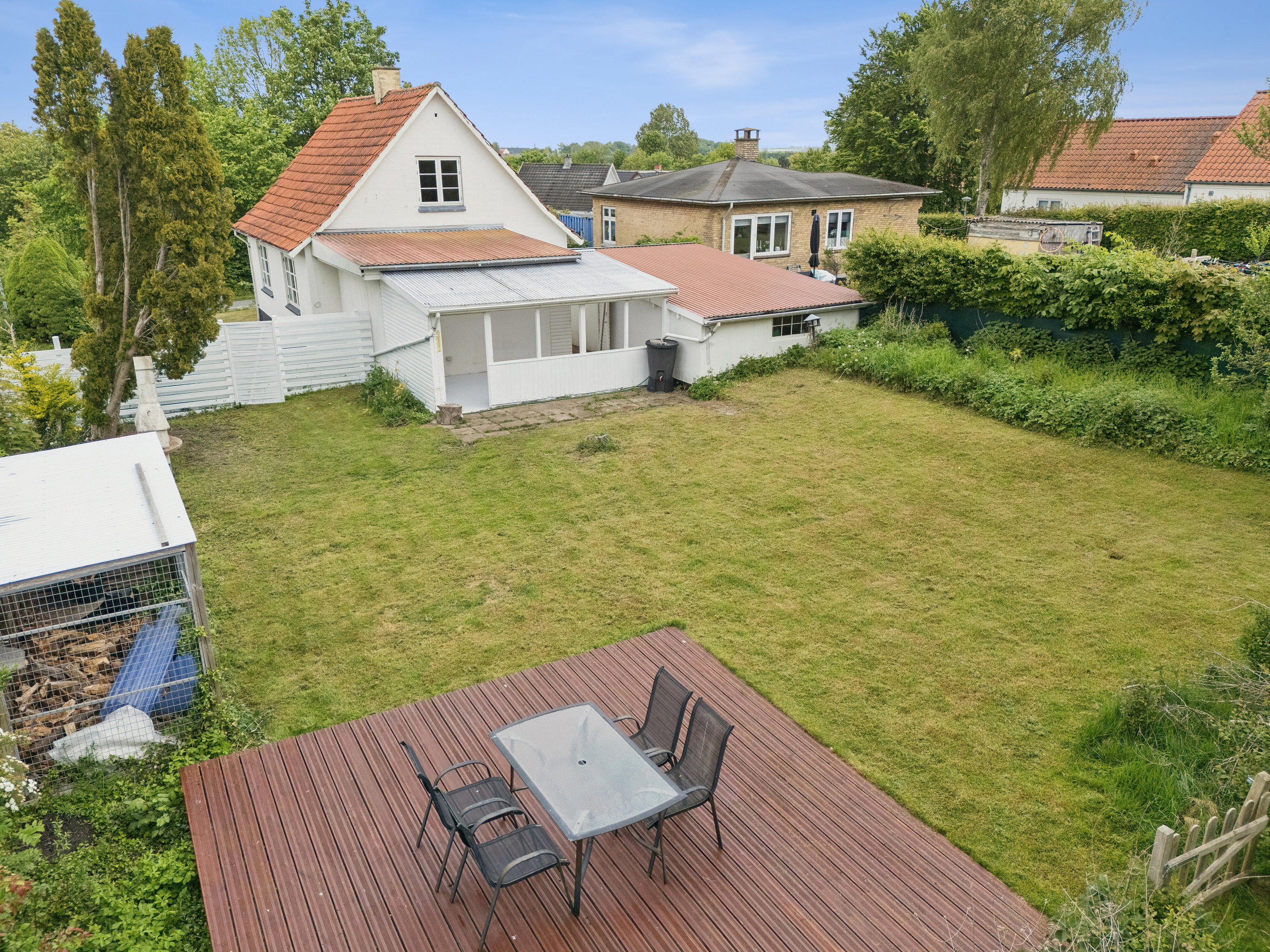 Fremhævet set fra haven billede i fuldskærmstilstand. Billede af Byvej 3, 4591 Føllenslev