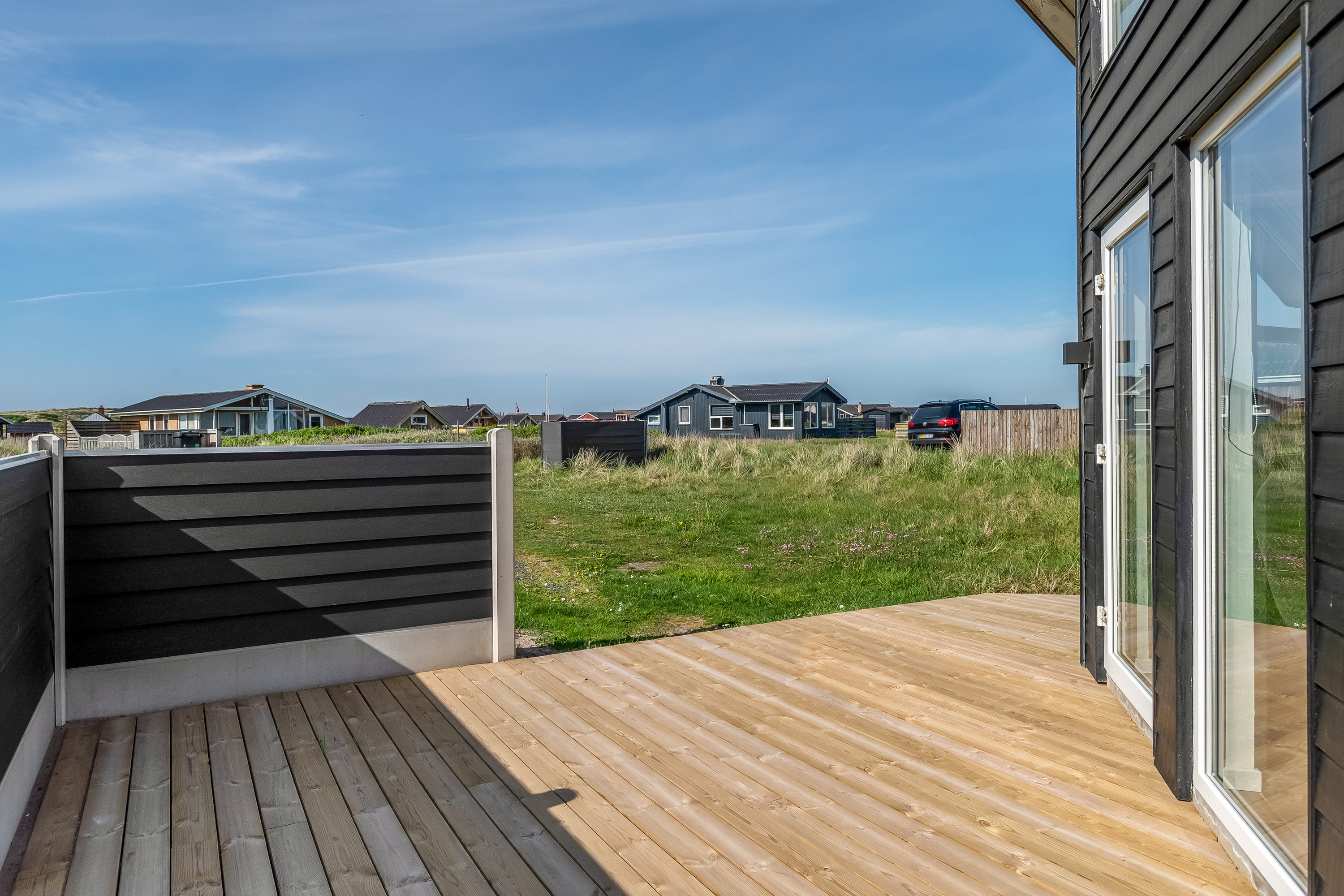 Fremhævet terrasse billede i fuldskærmstilstand. Billede af Stranden 19, Ferring, 7620 Lemvig