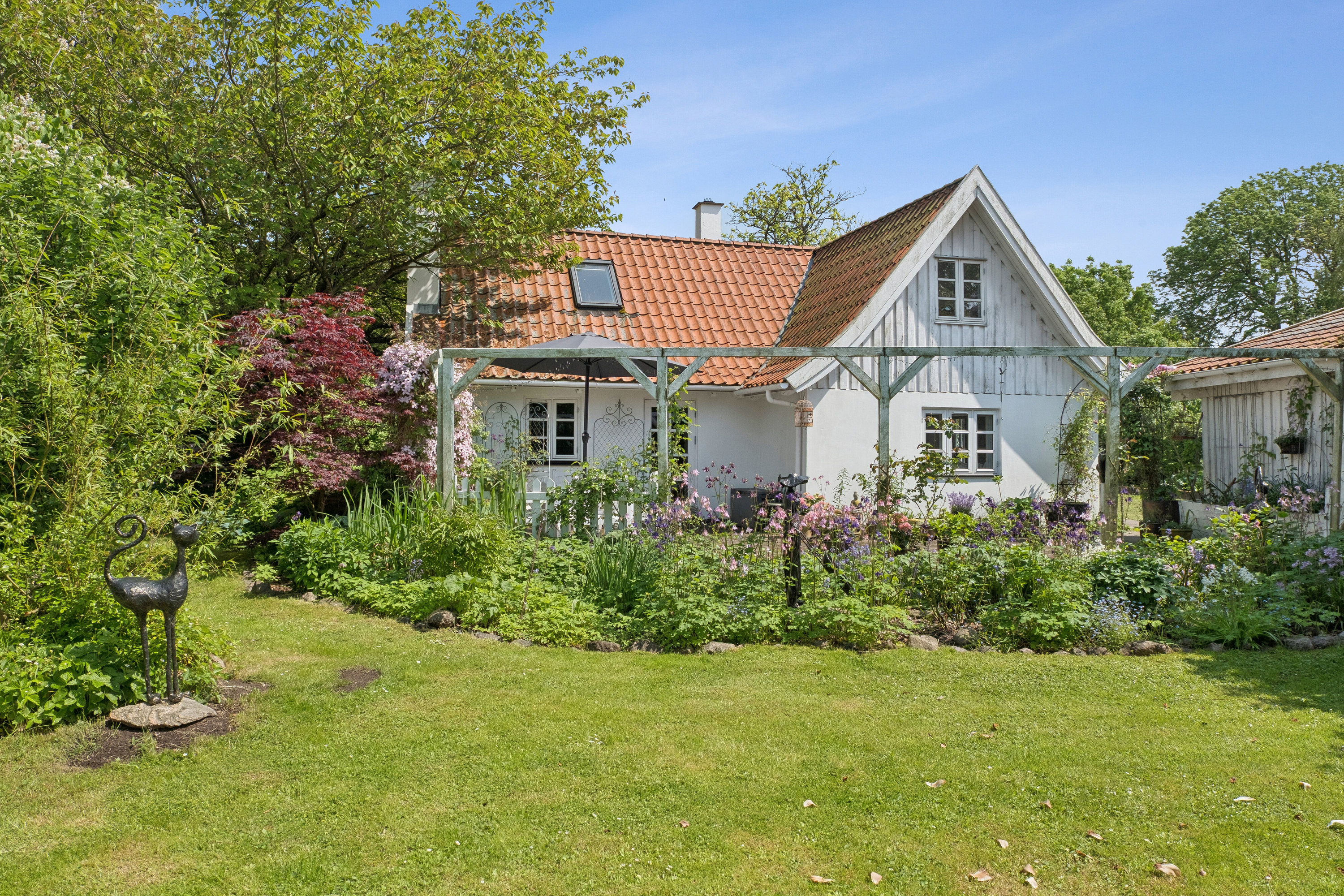 Fremhævet set fra haven billede i fuldskærmstilstand. Billede af Kagstrupvej 5, Kagstrup, 4160 Herlufmagle